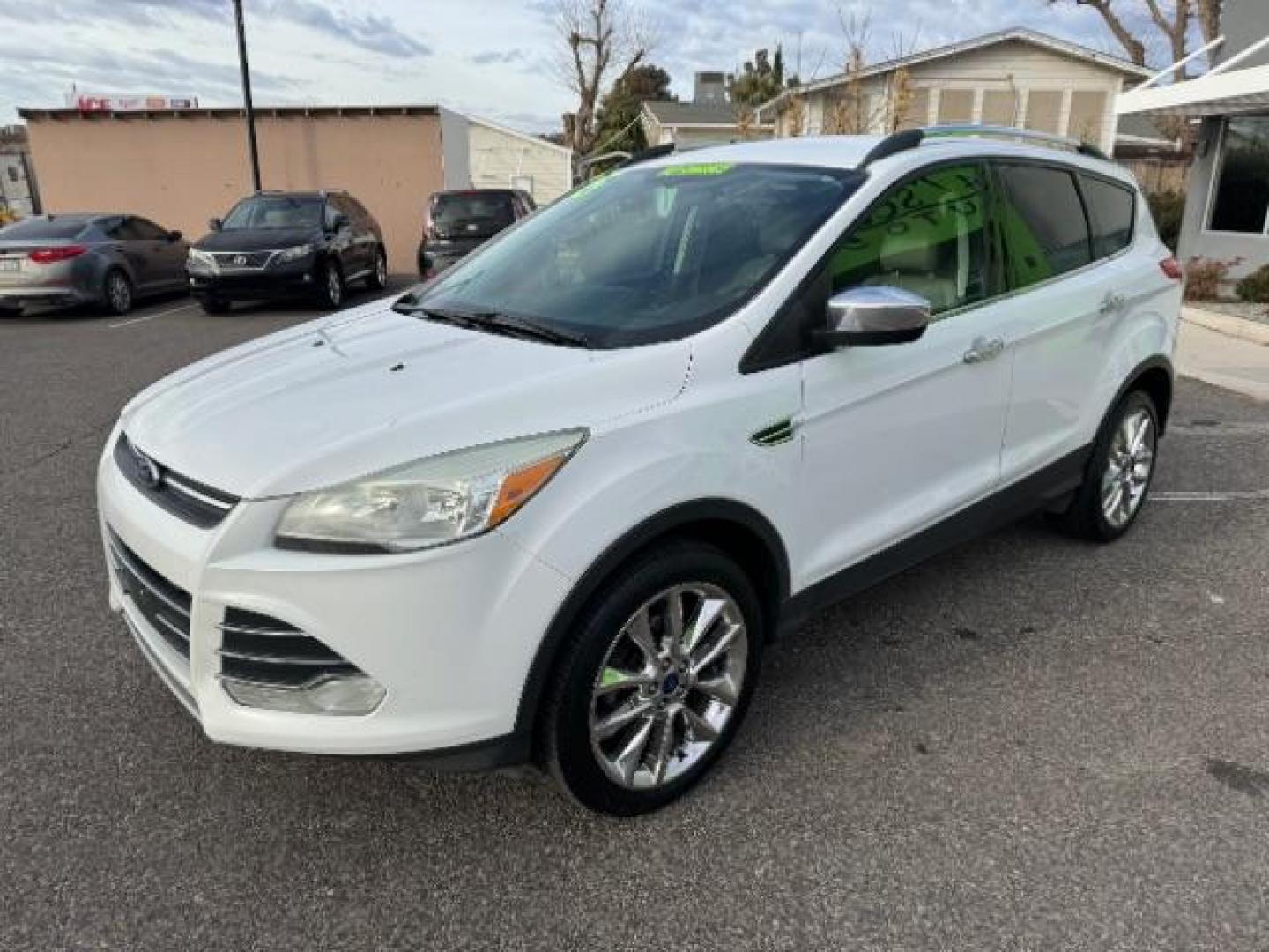 2015 Oxford White /Charcoal Black Ford Escape SE FWD (1FMCU0GX1FU) with an 1.6L L4 DOHC 16V engine, 6-Speed Automatic transmission, located at 1865 East Red Hills Pkwy, St. George, 84770, (435) 628-0023, 37.120850, -113.543640 - Photo#3