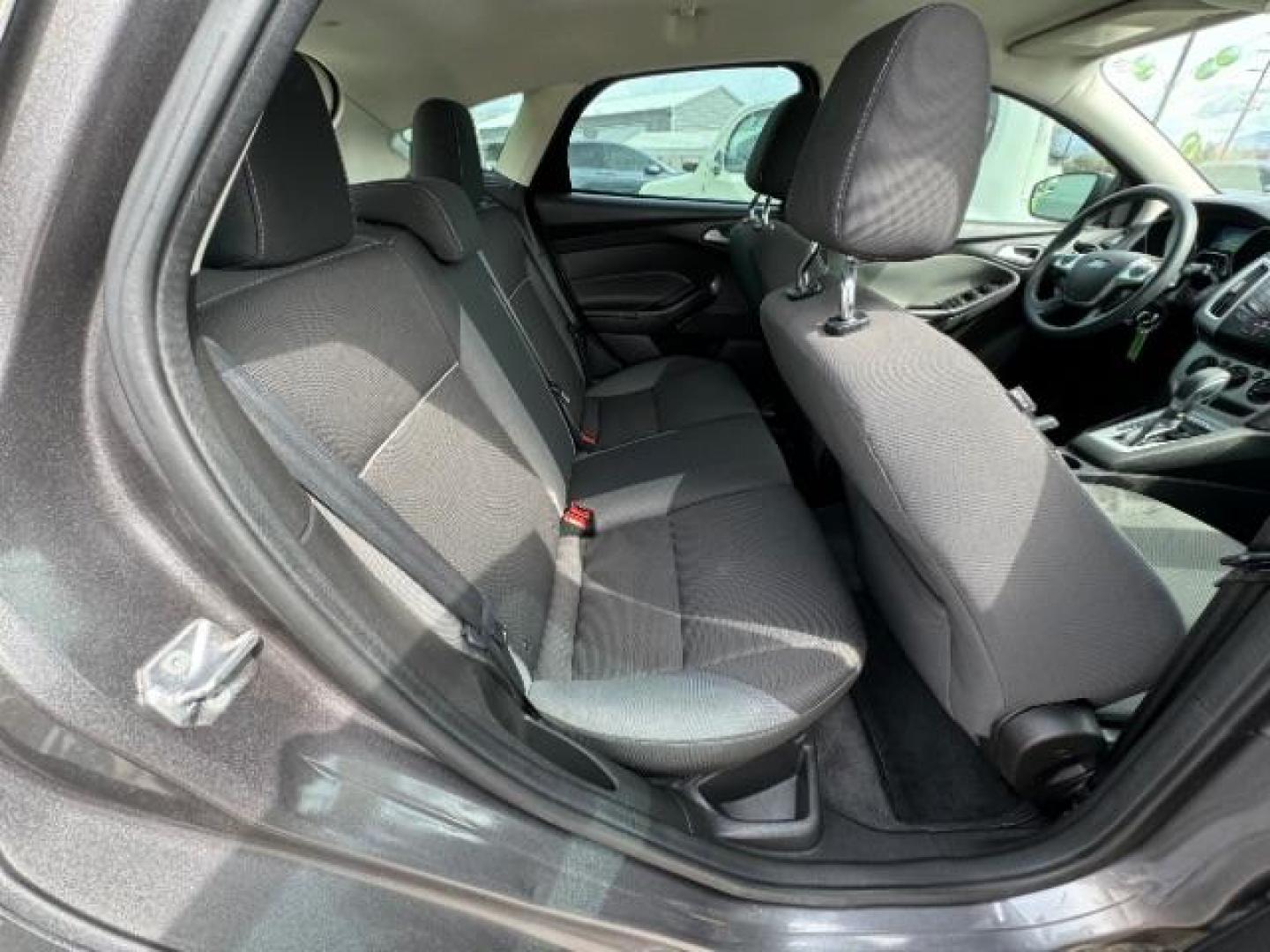 2012 Sterling Grey Metallic /Charcoal Black/Metal Gray Cloth Interior Ford Focus SE (1FAHP3K24CL) with an 2.0L L4 DOHC 16V engine, 6-Speed Automatic transmission, located at 1865 East Red Hills Pkwy, St. George, 84770, (435) 628-0023, 37.120850, -113.543640 - Photo#29