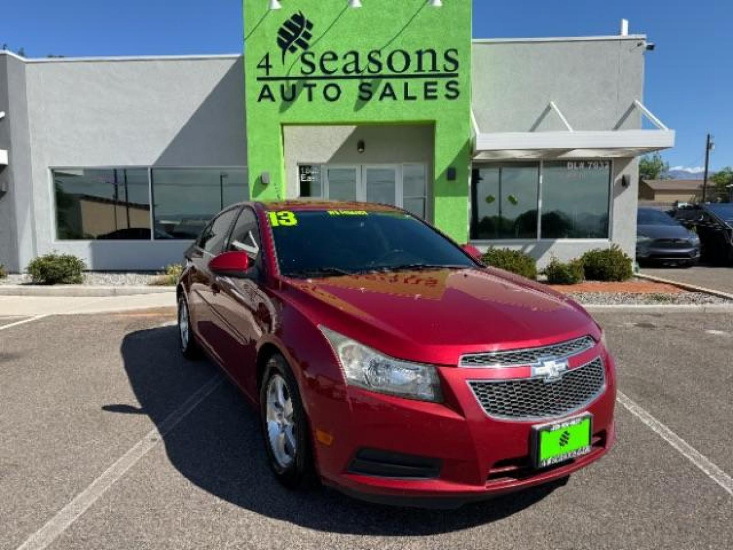 2013 Crystal Red Tintcoat /Jet Black Cloth Inte Chevrolet Cruze 1LT Auto (1G1PC5SB4D7) with an 1.4L L4 DOHC 16V TUR engine, 6-Speed Automatic transmission, located at 940 North Main Street, Cedar City, UT, 84720, (435) 628-0023, 37.692936, -113.061897 - We specialize in helping ALL people get the best financing available. No matter your credit score, good, bad or none we can get you an amazing rate. Had a bankruptcy, divorce, or repossessions? We give you the green light to get your credit back on the road. Low down and affordable payments that fit - Photo#0