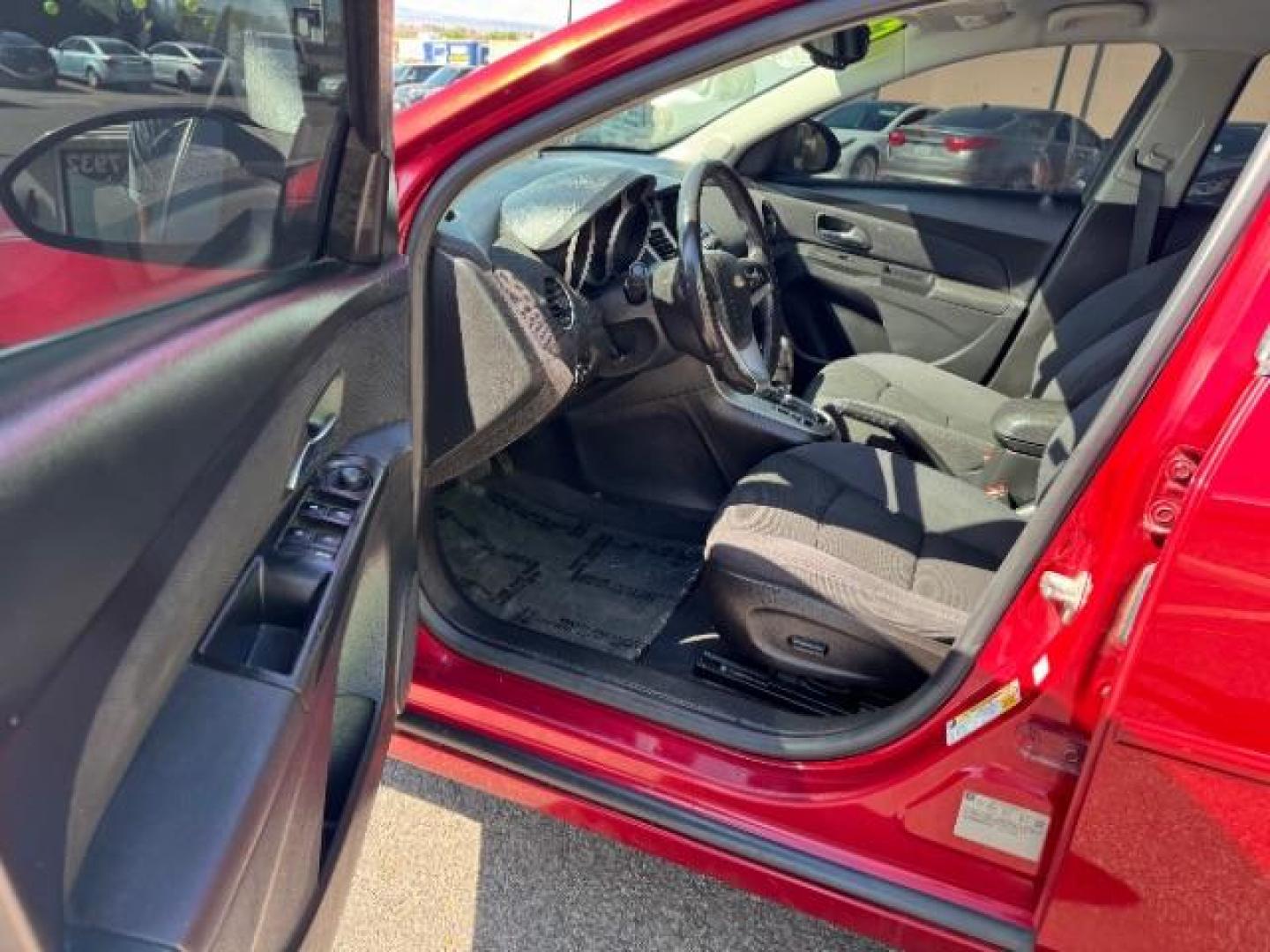 2013 Crystal Red Tintcoat /Jet Black Cloth Inte Chevrolet Cruze 1LT Auto (1G1PC5SB4D7) with an 1.4L L4 DOHC 16V TUR engine, 6-Speed Automatic transmission, located at 940 North Main Street, Cedar City, UT, 84720, (435) 628-0023, 37.692936, -113.061897 - We specialize in helping ALL people get the best financing available. No matter your credit score, good, bad or none we can get you an amazing rate. Had a bankruptcy, divorce, or repossessions? We give you the green light to get your credit back on the road. Low down and affordable payments that fit - Photo#12