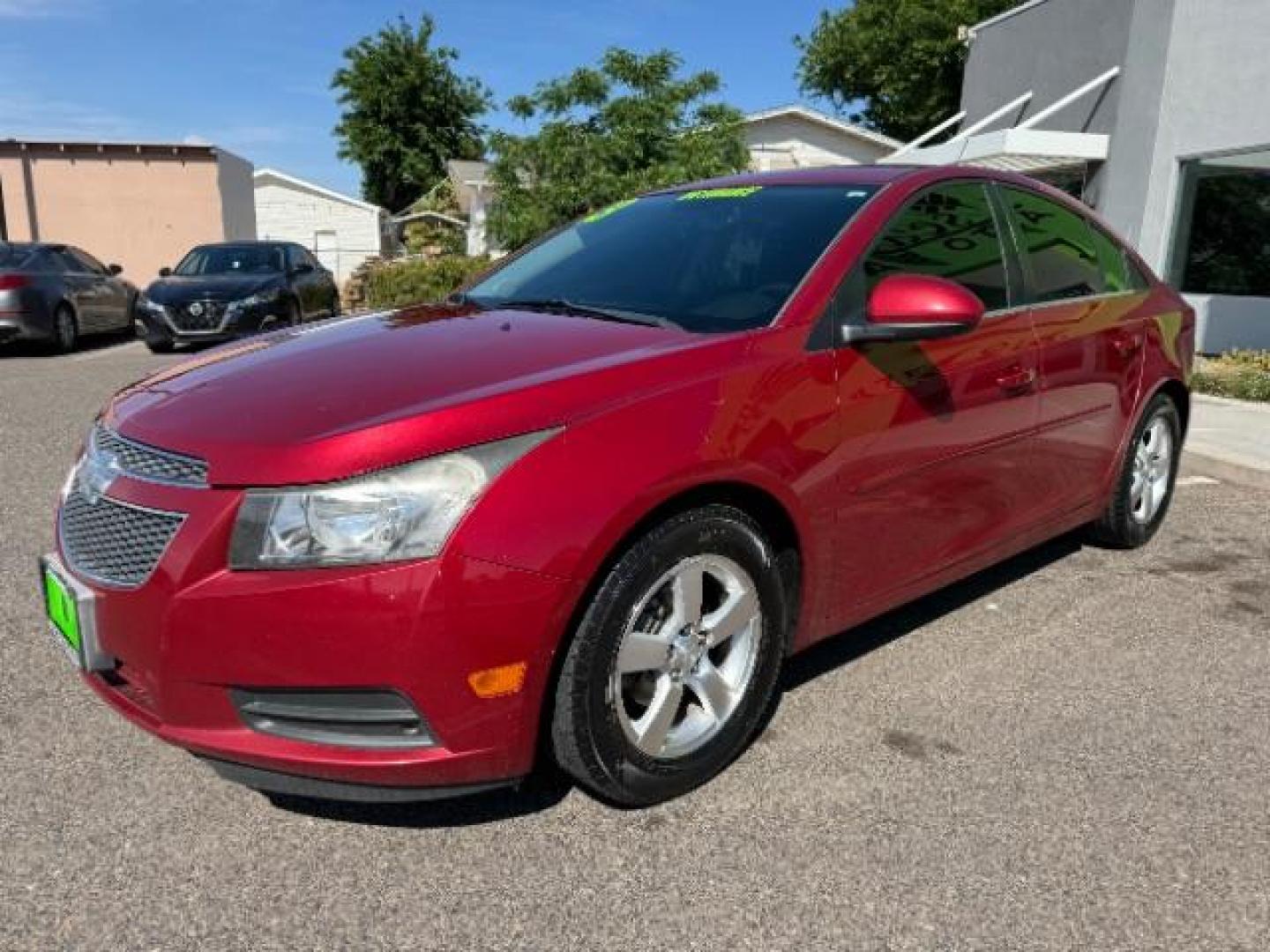 2013 Crystal Red Tintcoat /Jet Black Cloth Inte Chevrolet Cruze 1LT Auto (1G1PC5SB4D7) with an 1.4L L4 DOHC 16V TUR engine, 6-Speed Automatic transmission, located at 940 North Main Street, Cedar City, UT, 84720, (435) 628-0023, 37.692936, -113.061897 - We specialize in helping ALL people get the best financing available. No matter your credit score, good, bad or none we can get you an amazing rate. Had a bankruptcy, divorce, or repossessions? We give you the green light to get your credit back on the road. Low down and affordable payments that fit - Photo#2