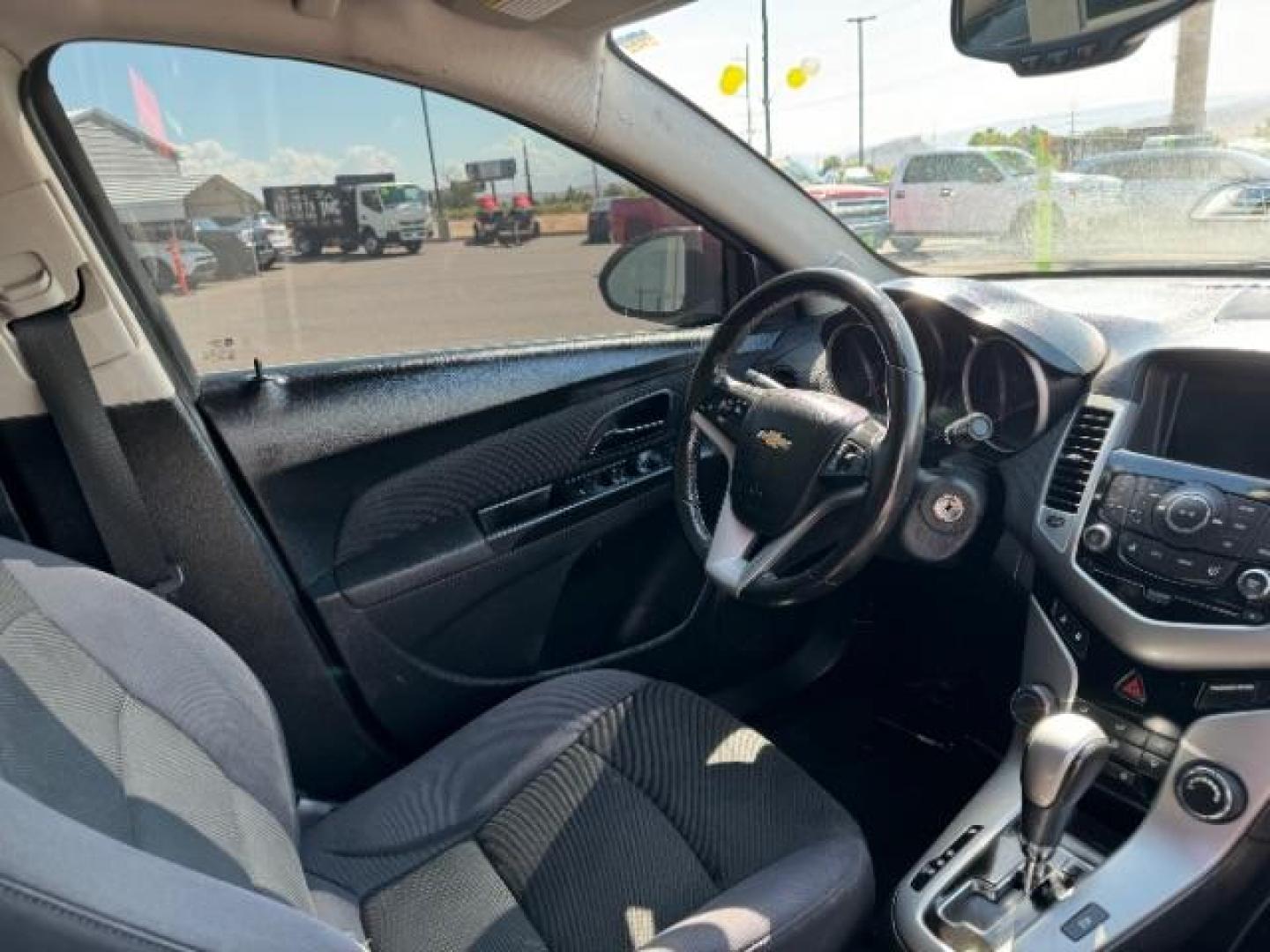 2013 Crystal Red Tintcoat /Jet Black Cloth Inte Chevrolet Cruze 1LT Auto (1G1PC5SB4D7) with an 1.4L L4 DOHC 16V TUR engine, 6-Speed Automatic transmission, located at 940 North Main Street, Cedar City, UT, 84720, (435) 628-0023, 37.692936, -113.061897 - We specialize in helping ALL people get the best financing available. No matter your credit score, good, bad or none we can get you an amazing rate. Had a bankruptcy, divorce, or repossessions? We give you the green light to get your credit back on the road. Low down and affordable payments that fit - Photo#35