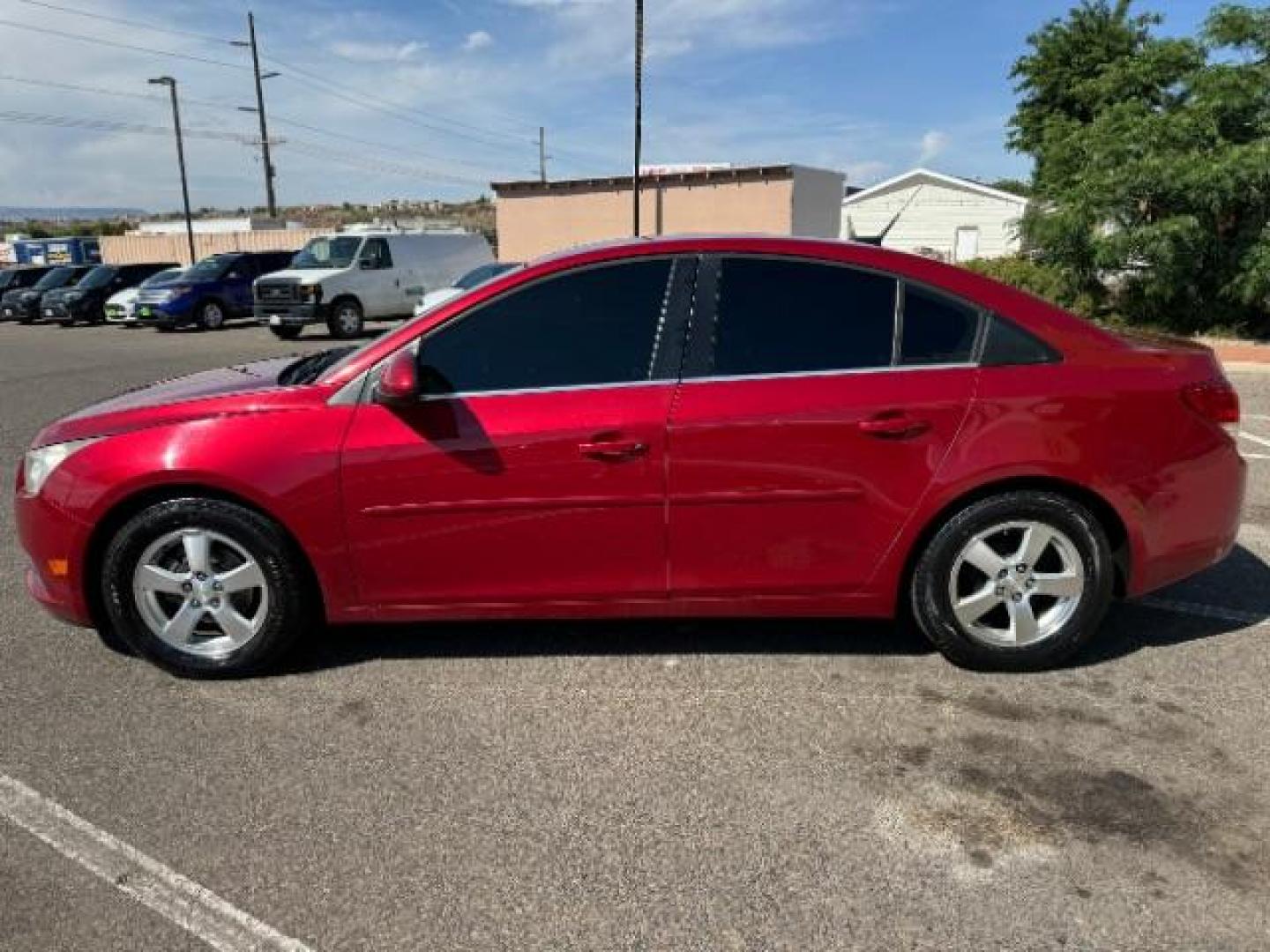 2013 Crystal Red Tintcoat /Jet Black Cloth Inte Chevrolet Cruze 1LT Auto (1G1PC5SB4D7) with an 1.4L L4 DOHC 16V TUR engine, 6-Speed Automatic transmission, located at 940 North Main Street, Cedar City, UT, 84720, (435) 628-0023, 37.692936, -113.061897 - We specialize in helping ALL people get the best financing available. No matter your credit score, good, bad or none we can get you an amazing rate. Had a bankruptcy, divorce, or repossessions? We give you the green light to get your credit back on the road. Low down and affordable payments that fit - Photo#3