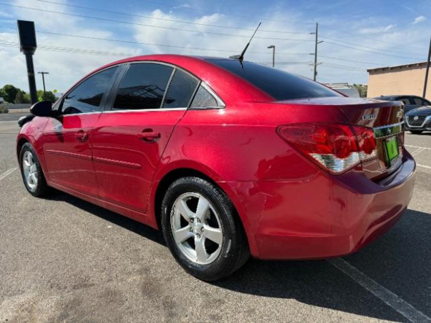 2013 Crystal Red Tintcoat /Jet Black Cloth Inte Chevrolet Cruze 1LT Auto (1G1PC5SB4D7) with an 1.4L L4 DOHC 16V TUR engine, 6-Speed Automatic transmission, located at 940 North Main Street, Cedar City, UT, 84720, (435) 628-0023, 37.692936, -113.061897 - We specialize in helping ALL people get the best financing available. No matter your credit score, good, bad or none we can get you an amazing rate. Had a bankruptcy, divorce, or repossessions? We give you the green light to get your credit back on the road. Low down and affordable payments that fit - Photo#4