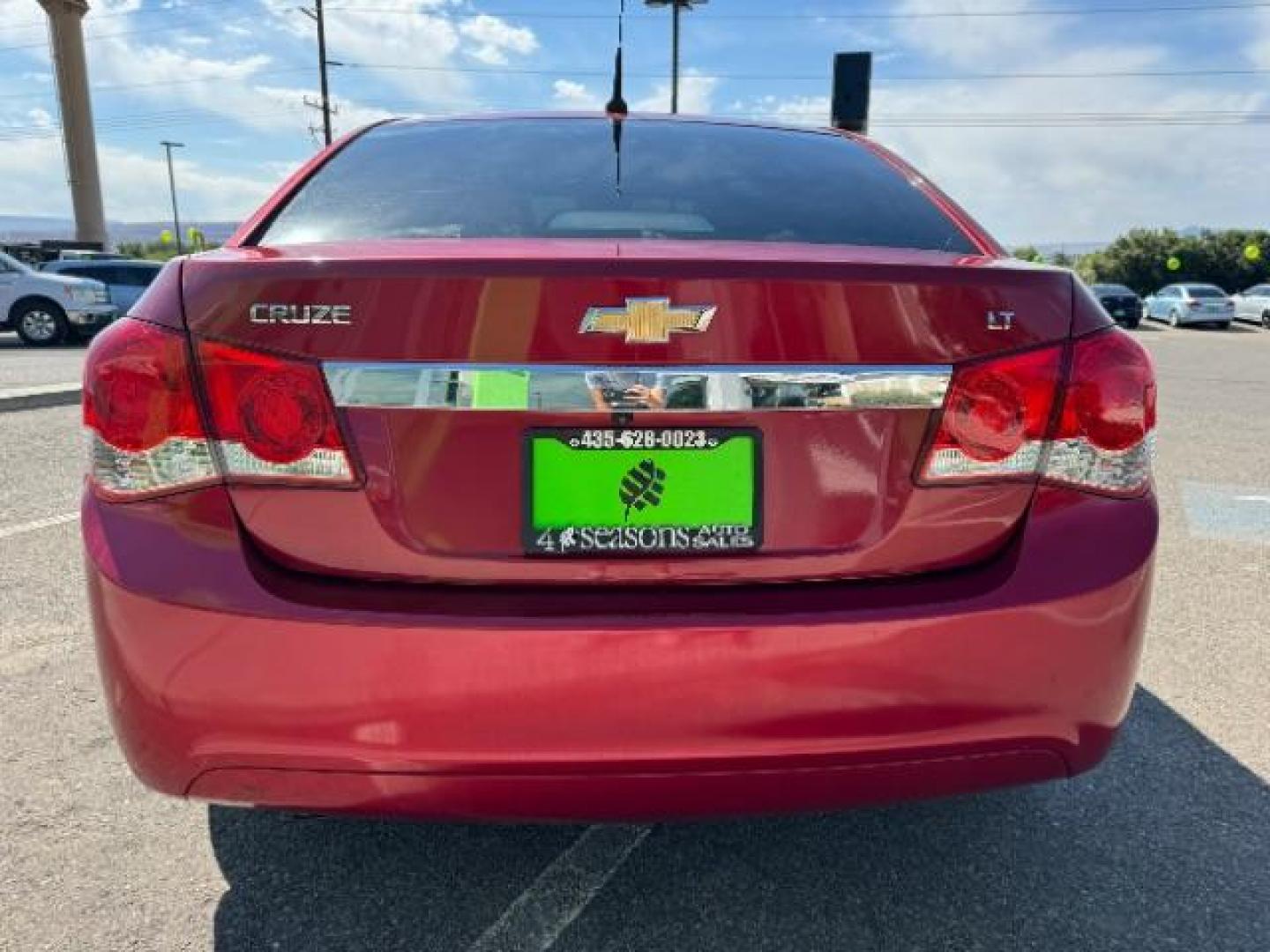 2013 Crystal Red Tintcoat /Jet Black Cloth Inte Chevrolet Cruze 1LT Auto (1G1PC5SB4D7) with an 1.4L L4 DOHC 16V TUR engine, 6-Speed Automatic transmission, located at 940 North Main Street, Cedar City, UT, 84720, (435) 628-0023, 37.692936, -113.061897 - We specialize in helping ALL people get the best financing available. No matter your credit score, good, bad or none we can get you an amazing rate. Had a bankruptcy, divorce, or repossessions? We give you the green light to get your credit back on the road. Low down and affordable payments that fit - Photo#5