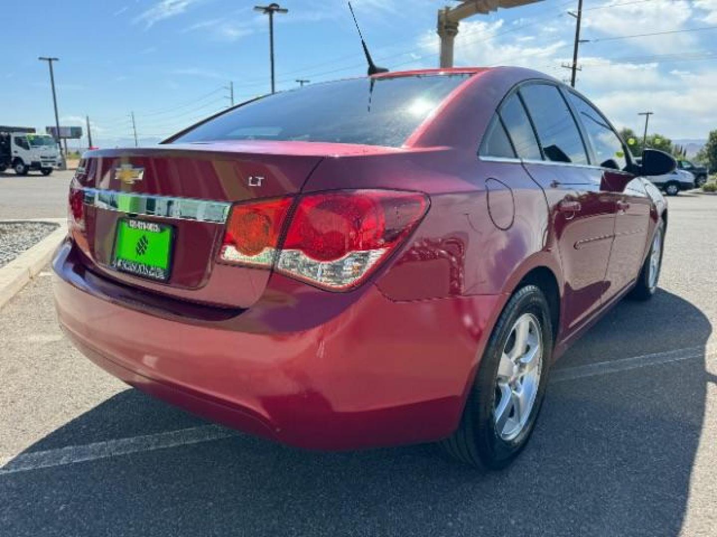 2013 Crystal Red Tintcoat /Jet Black Cloth Inte Chevrolet Cruze 1LT Auto (1G1PC5SB4D7) with an 1.4L L4 DOHC 16V TUR engine, 6-Speed Automatic transmission, located at 940 North Main Street, Cedar City, UT, 84720, (435) 628-0023, 37.692936, -113.061897 - We specialize in helping ALL people get the best financing available. No matter your credit score, good, bad or none we can get you an amazing rate. Had a bankruptcy, divorce, or repossessions? We give you the green light to get your credit back on the road. Low down and affordable payments that fit - Photo#6