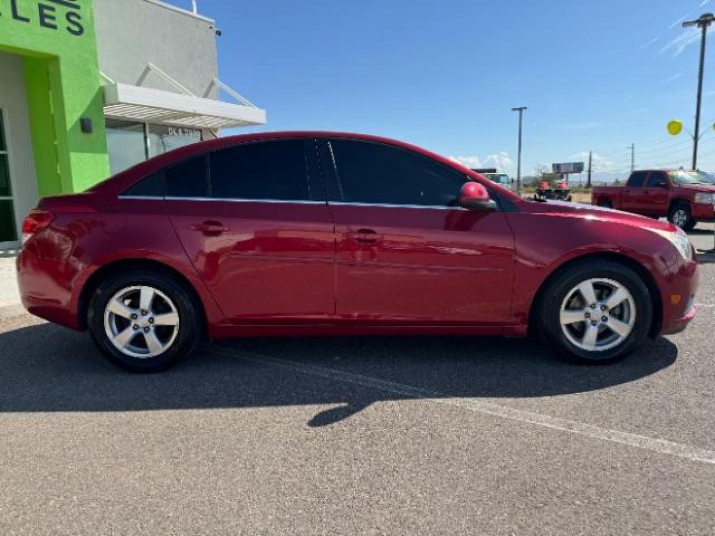 2013 Crystal Red Tintcoat /Jet Black Cloth Inte Chevrolet Cruze 1LT Auto (1G1PC5SB4D7) with an 1.4L L4 DOHC 16V TUR engine, 6-Speed Automatic transmission, located at 940 North Main Street, Cedar City, UT, 84720, (435) 628-0023, 37.692936, -113.061897 - We specialize in helping ALL people get the best financing available. No matter your credit score, good, bad or none we can get you an amazing rate. Had a bankruptcy, divorce, or repossessions? We give you the green light to get your credit back on the road. Low down and affordable payments that fit - Photo#7