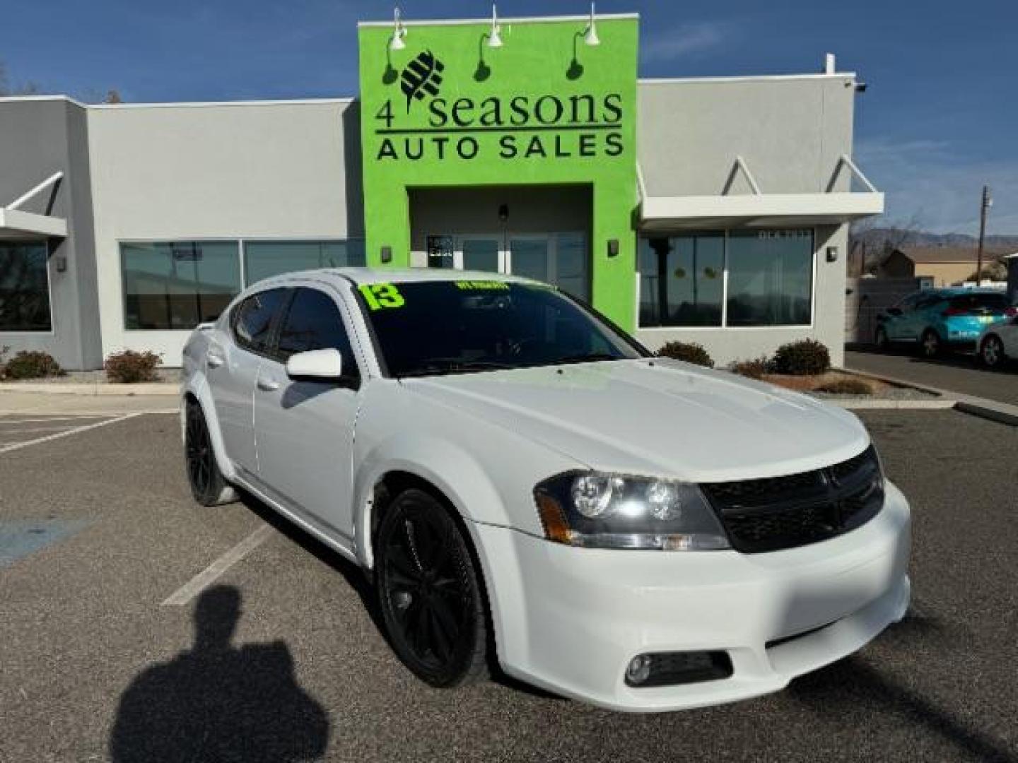 2013 Bright White /Black Cloth Interior Dodge Avenger SXT (1C3CDZCG0DN) with an 3.6L V6 DOHC 24V FFV engine, 6-Speed Automatic transmission, located at 940 North Main Street, Cedar City, UT, 84720, (435) 628-0023, 37.692936, -113.061897 - Photo#0