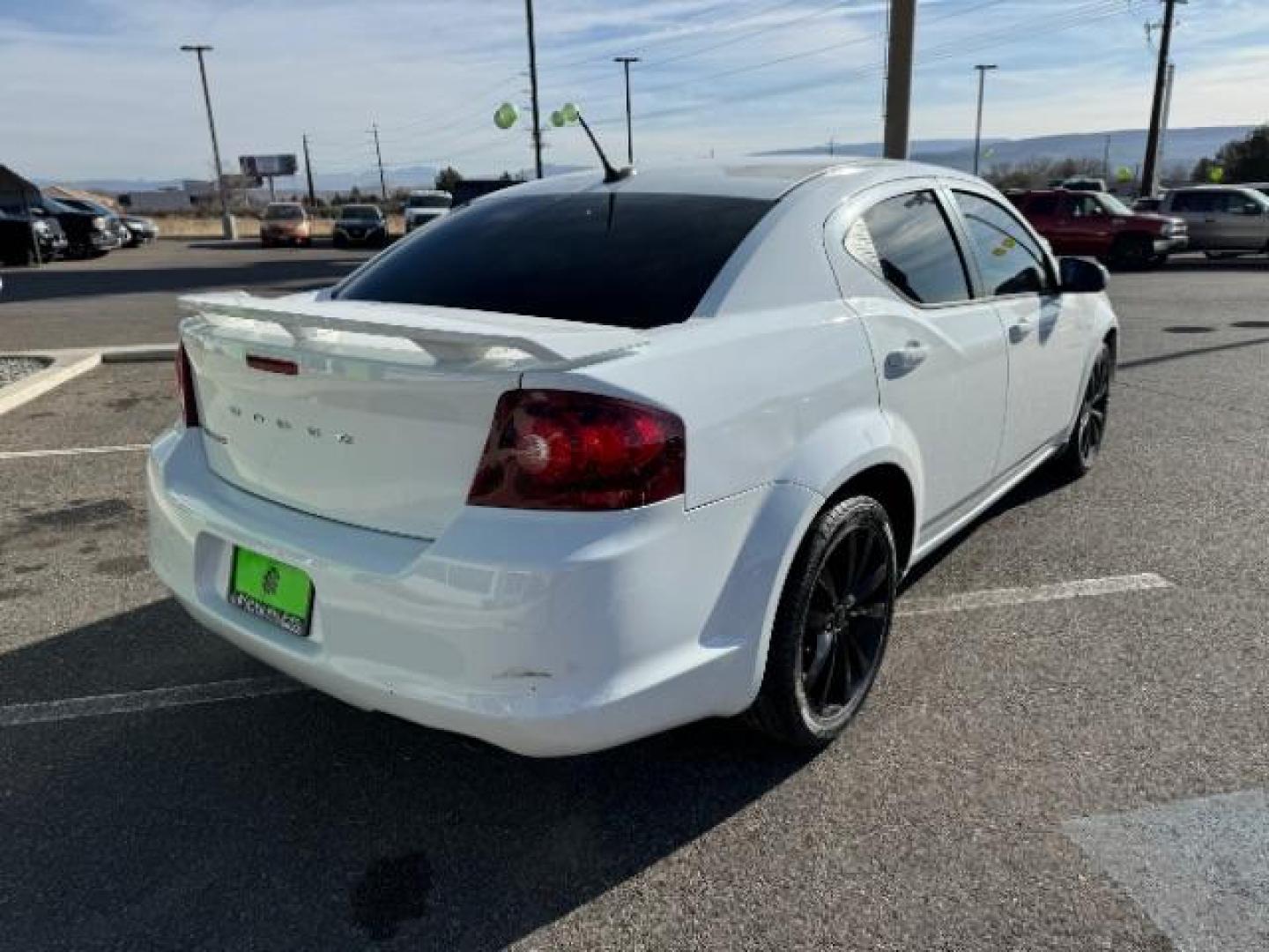 2013 Bright White /Black Cloth Interior Dodge Avenger SXT (1C3CDZCG0DN) with an 3.6L V6 DOHC 24V FFV engine, 6-Speed Automatic transmission, located at 940 North Main Street, Cedar City, UT, 84720, (435) 628-0023, 37.692936, -113.061897 - Photo#9