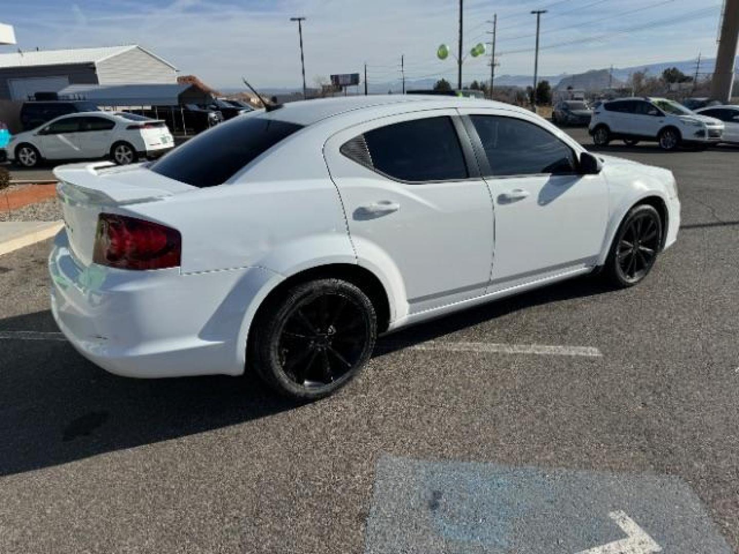 2013 Bright White /Black Cloth Interior Dodge Avenger SXT (1C3CDZCG0DN) with an 3.6L V6 DOHC 24V FFV engine, 6-Speed Automatic transmission, located at 940 North Main Street, Cedar City, UT, 84720, (435) 628-0023, 37.692936, -113.061897 - Photo#10