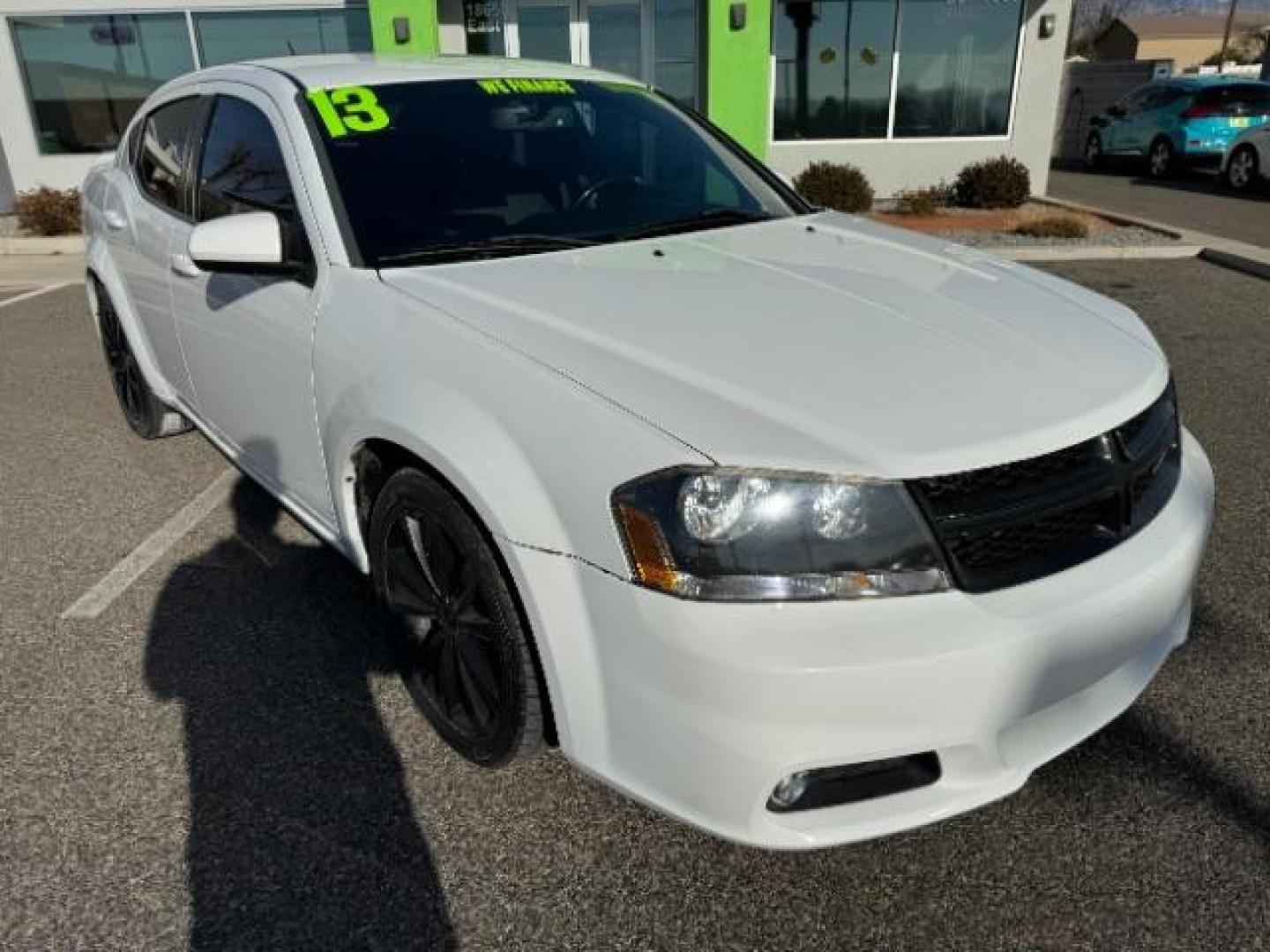 2013 Bright White /Black Cloth Interior Dodge Avenger SXT (1C3CDZCG0DN) with an 3.6L V6 DOHC 24V FFV engine, 6-Speed Automatic transmission, located at 940 North Main Street, Cedar City, UT, 84720, (435) 628-0023, 37.692936, -113.061897 - Photo#1