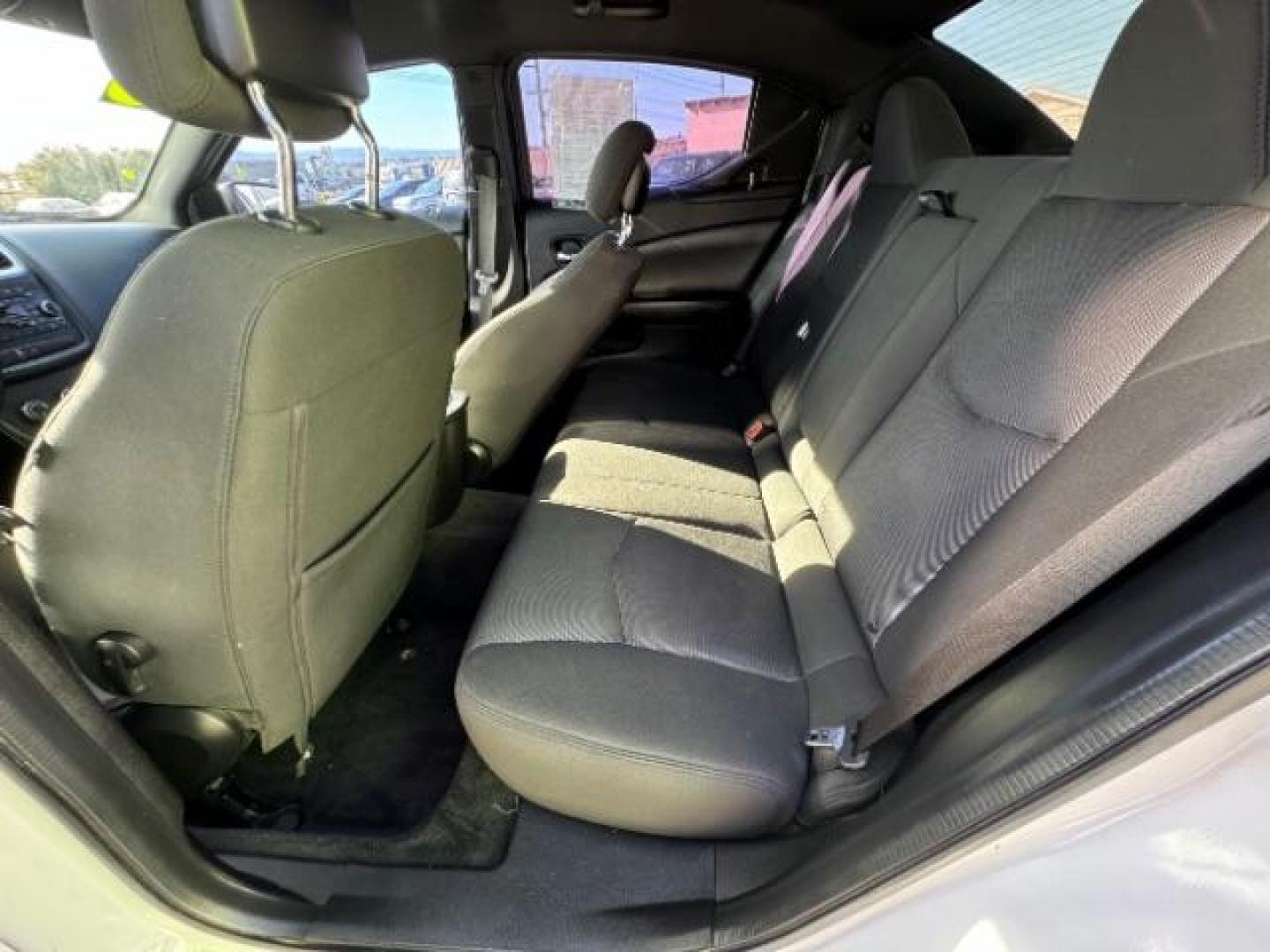 2013 Bright White /Black Cloth Interior Dodge Avenger SXT (1C3CDZCG0DN) with an 3.6L V6 DOHC 24V FFV engine, 6-Speed Automatic transmission, located at 940 North Main Street, Cedar City, UT, 84720, (435) 628-0023, 37.692936, -113.061897 - Photo#25