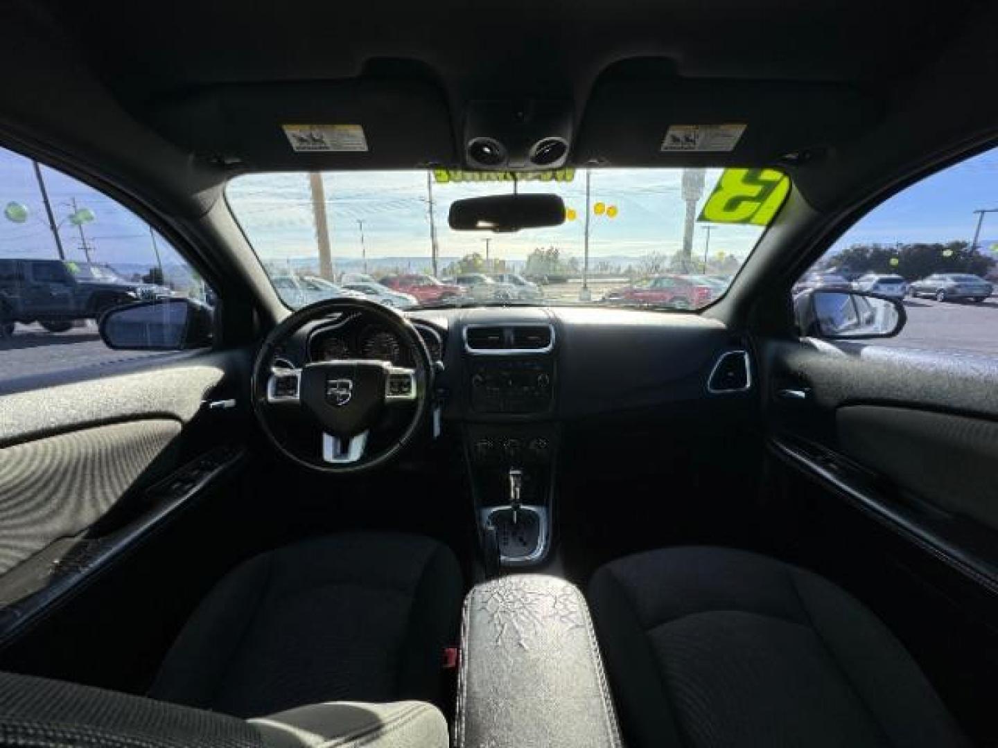 2013 Bright White /Black Cloth Interior Dodge Avenger SXT (1C3CDZCG0DN) with an 3.6L V6 DOHC 24V FFV engine, 6-Speed Automatic transmission, located at 940 North Main Street, Cedar City, UT, 84720, (435) 628-0023, 37.692936, -113.061897 - Photo#27