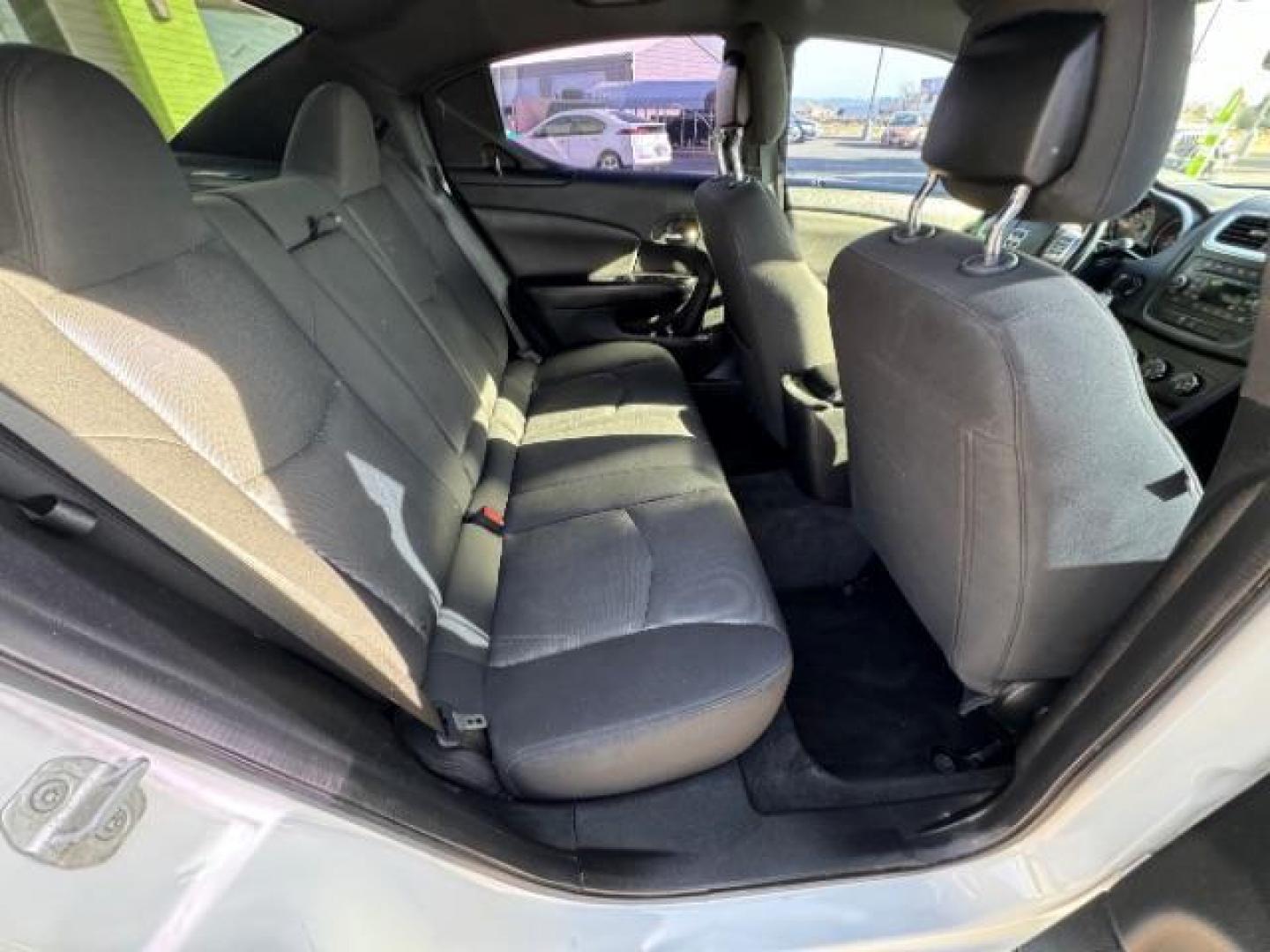 2013 Bright White /Black Cloth Interior Dodge Avenger SXT (1C3CDZCG0DN) with an 3.6L V6 DOHC 24V FFV engine, 6-Speed Automatic transmission, located at 940 North Main Street, Cedar City, UT, 84720, (435) 628-0023, 37.692936, -113.061897 - Photo#30