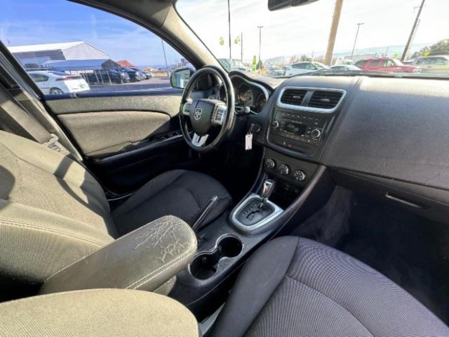 2013 Bright White /Black Cloth Interior Dodge Avenger SXT (1C3CDZCG0DN) with an 3.6L V6 DOHC 24V FFV engine, 6-Speed Automatic transmission, located at 940 North Main Street, Cedar City, UT, 84720, (435) 628-0023, 37.692936, -113.061897 - Photo#33