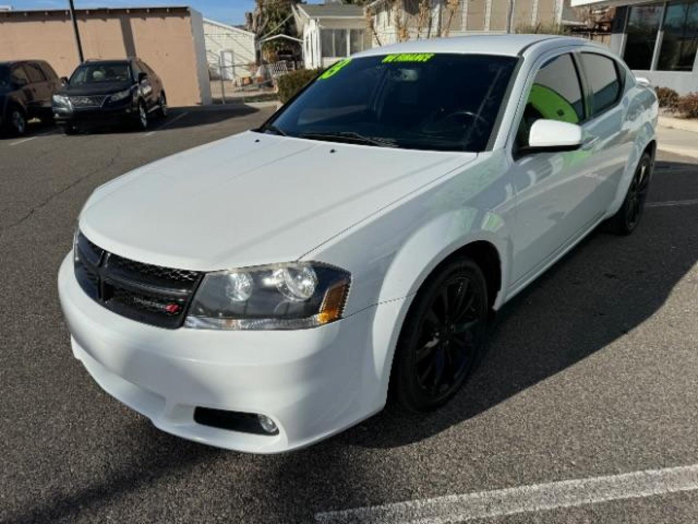 2013 Bright White /Black Cloth Interior Dodge Avenger SXT (1C3CDZCG0DN) with an 3.6L V6 DOHC 24V FFV engine, 6-Speed Automatic transmission, located at 940 North Main Street, Cedar City, UT, 84720, (435) 628-0023, 37.692936, -113.061897 - Photo#3