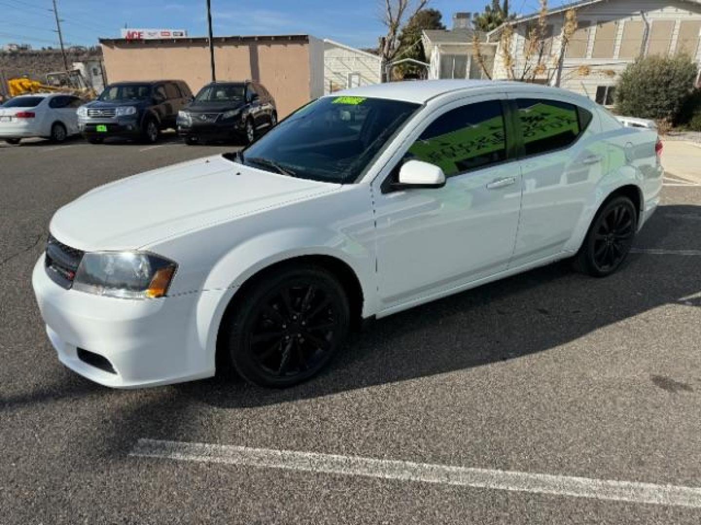 2013 Bright White /Black Cloth Interior Dodge Avenger SXT (1C3CDZCG0DN) with an 3.6L V6 DOHC 24V FFV engine, 6-Speed Automatic transmission, located at 940 North Main Street, Cedar City, UT, 84720, (435) 628-0023, 37.692936, -113.061897 - Photo#4