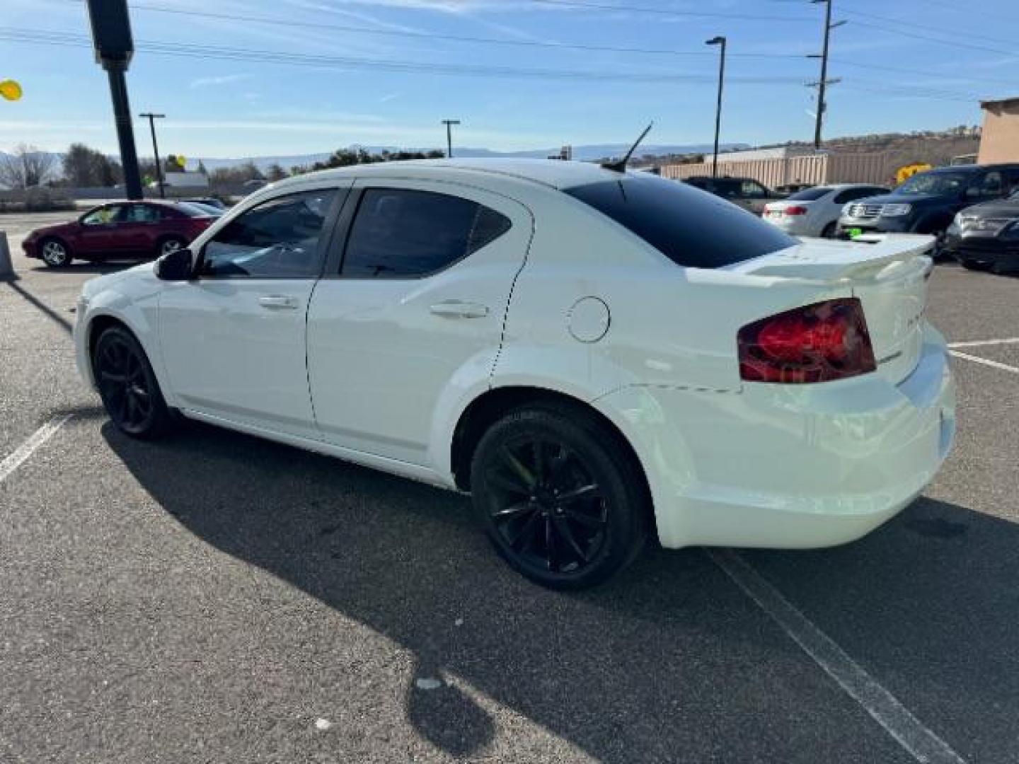 2013 Bright White /Black Cloth Interior Dodge Avenger SXT (1C3CDZCG0DN) with an 3.6L V6 DOHC 24V FFV engine, 6-Speed Automatic transmission, located at 940 North Main Street, Cedar City, UT, 84720, (435) 628-0023, 37.692936, -113.061897 - Photo#6