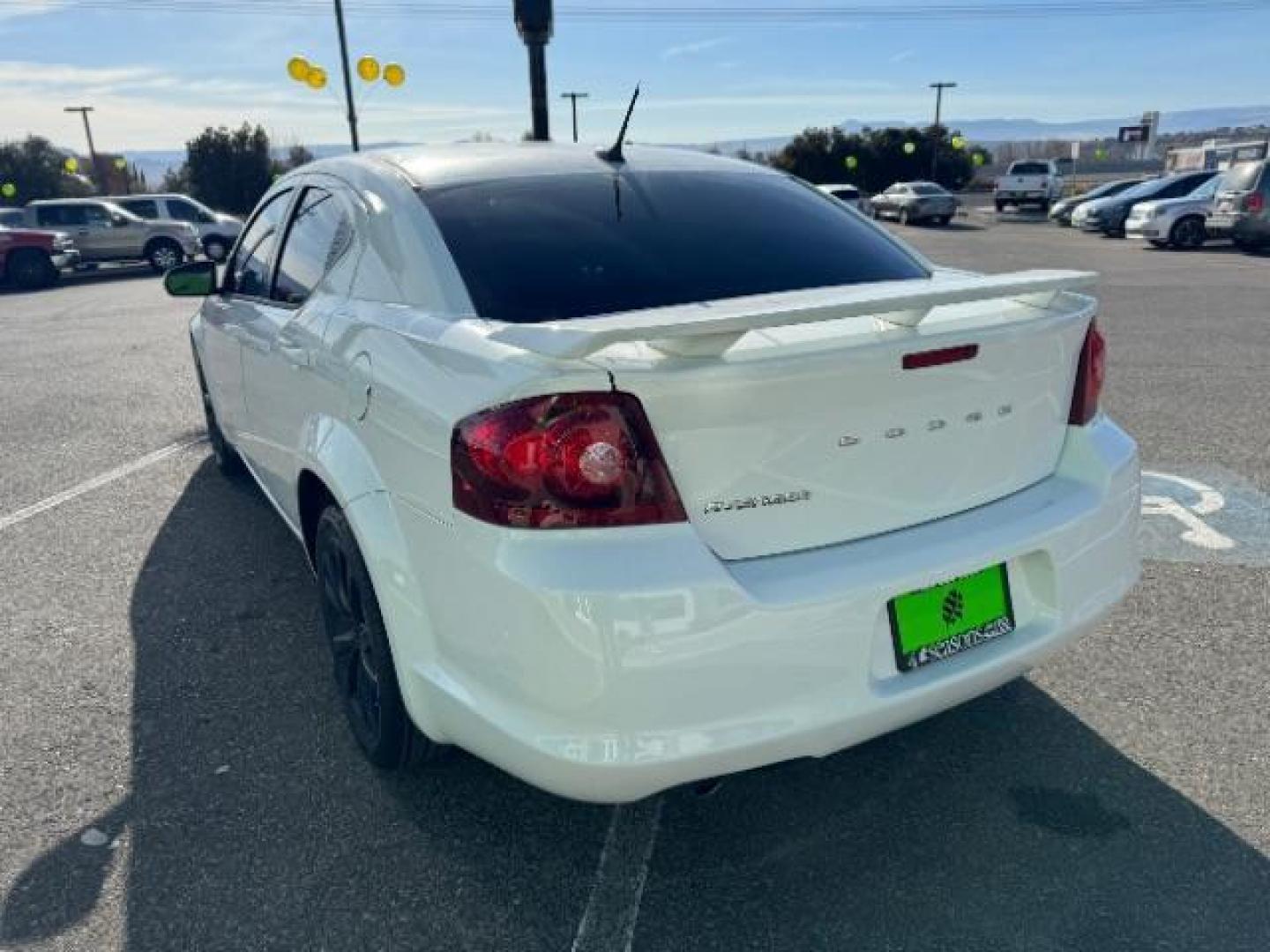 2013 Bright White /Black Cloth Interior Dodge Avenger SXT (1C3CDZCG0DN) with an 3.6L V6 DOHC 24V FFV engine, 6-Speed Automatic transmission, located at 940 North Main Street, Cedar City, UT, 84720, (435) 628-0023, 37.692936, -113.061897 - Photo#7