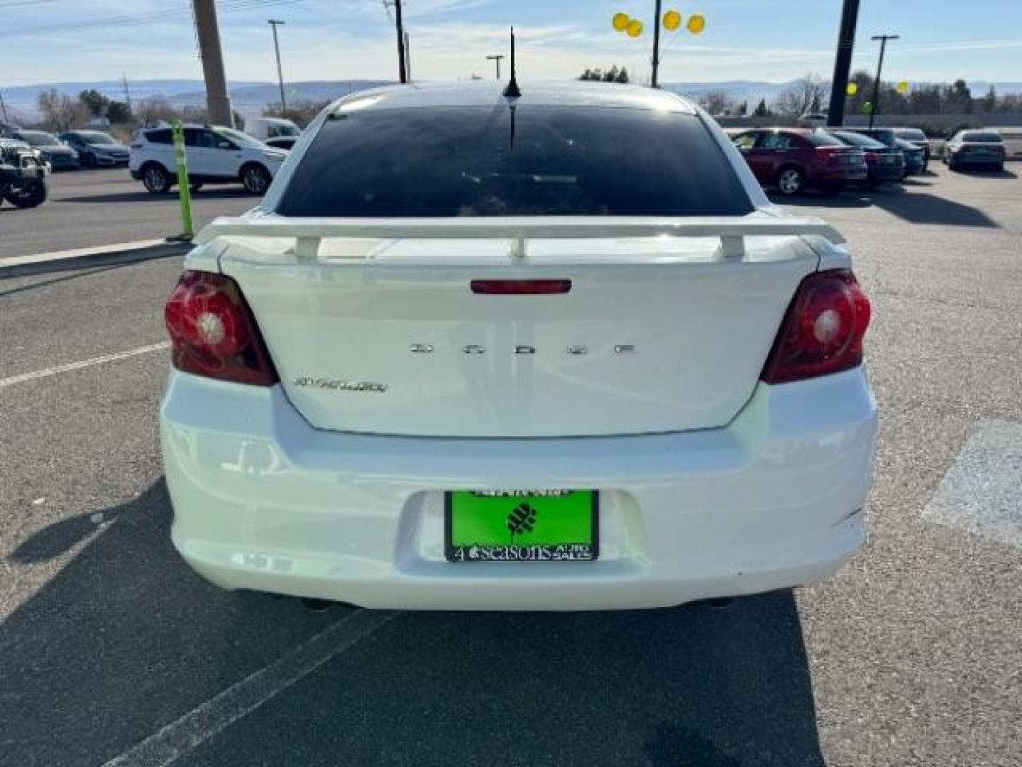 2013 Bright White /Black Cloth Interior Dodge Avenger SXT (1C3CDZCG0DN) with an 3.6L V6 DOHC 24V FFV engine, 6-Speed Automatic transmission, located at 940 North Main Street, Cedar City, UT, 84720, (435) 628-0023, 37.692936, -113.061897 - Photo#8