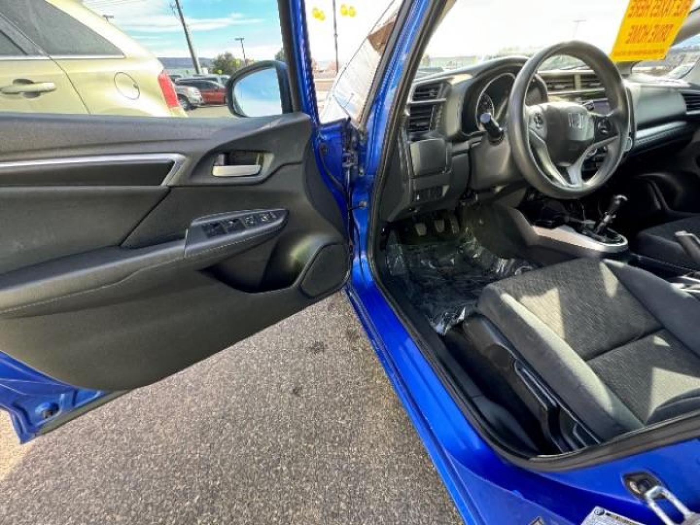 2015 Aegean Blue Metallic Honda Fit HATCHBACK 4-DR (3HGGK5G59FM) with an 1.5L L4 SOHC 16V engine, 6-Speed Manual transmission, located at 1865 East Red Hills Pkwy, St. George, 84770, (435) 628-0023, 37.120850, -113.543640 - We specialize in helping ALL people get the best financing available. No matter your credit score, good, bad or none we can get you an amazing rate. Had a bankruptcy, divorce, or repossessions? We give you the green light to get your credit back on the road. Low down and affordable payments that fit - Photo#15