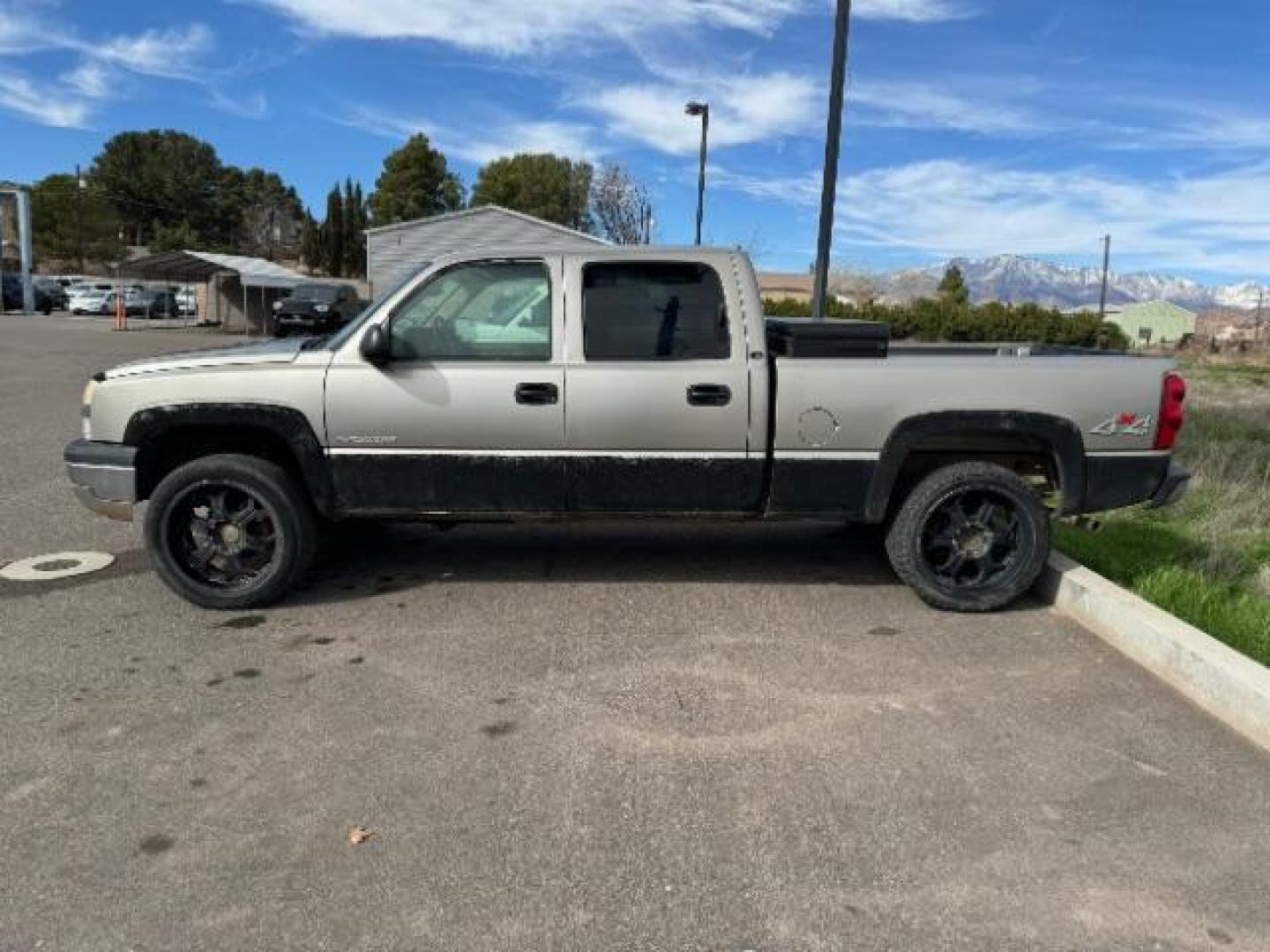 2003 Light Pewter Metalli /Dark Charcoal Cloth Interior Chevrolet Silverado 1500 HD LS Crew Cab 4WD (1GCGK13U03F) with an 6.0L V8 OHV 16V engine, 4-Speed Automatic transmission, located at 1865 East Red Hills Pkwy, St. George, 84770, (435) 628-0023, 37.120850, -113.543640 - This vehicle is a Mechanic Special. This means it will need some love. Runs a drives fine but has body damage, leaks or other mechanical issues. It did NOT pass our 50 point inspection. Get a great deal on a less than perfect car. These cars do NOT qualify for our in house financing. Cash and carry, - Photo#1