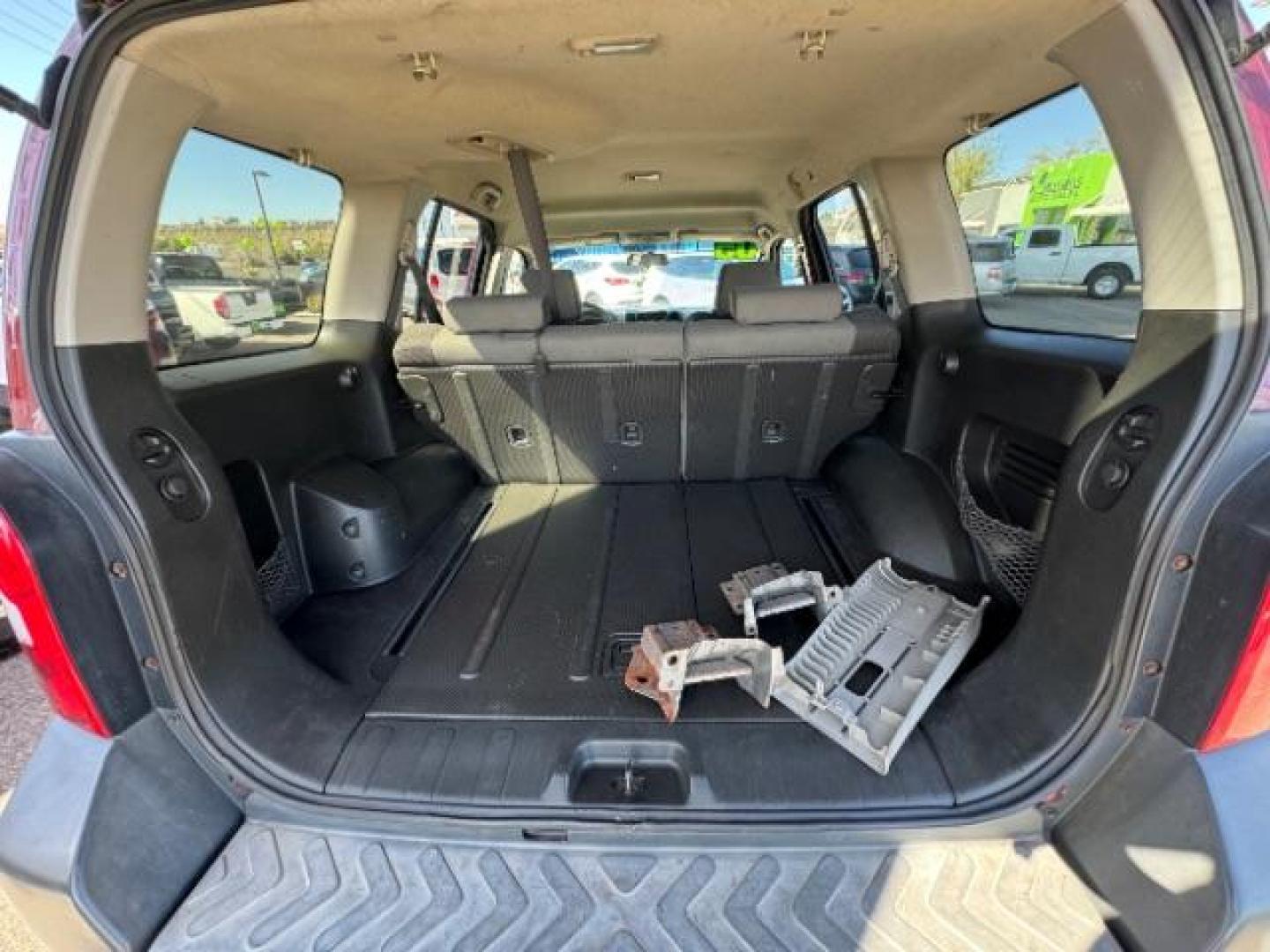 2005 Red Brawn /Desert Cloth Interior Nissan Xterra S 4WD (5N1AN08W55C) with an 4.0L V6 DOHC 24V engine, 5-Speed Automatic transmission, located at 1865 East Red Hills Pkwy, St. George, 84770, (435) 628-0023, 37.120850, -113.543640 - Photo#13