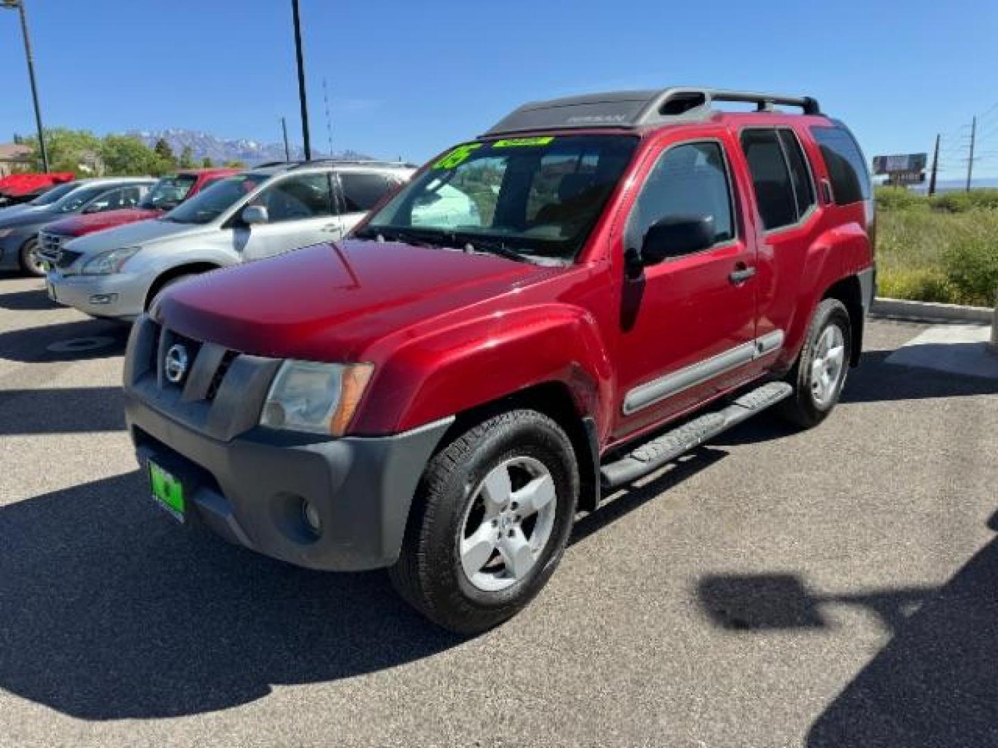 2005 Red Brawn /Desert Cloth Interior Nissan Xterra S 4WD (5N1AN08W55C) with an 4.0L V6 DOHC 24V engine, 5-Speed Automatic transmission, located at 1865 East Red Hills Pkwy, St. George, 84770, (435) 628-0023, 37.120850, -113.543640 - Photo#2