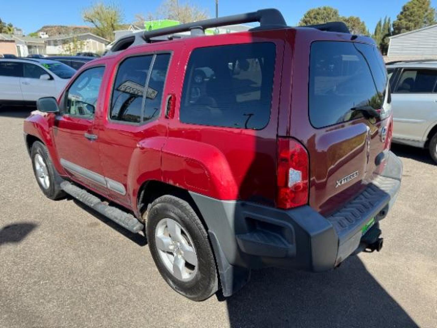 2005 Red Brawn /Desert Cloth Interior Nissan Xterra S 4WD (5N1AN08W55C) with an 4.0L V6 DOHC 24V engine, 5-Speed Automatic transmission, located at 1865 East Red Hills Pkwy, St. George, 84770, (435) 628-0023, 37.120850, -113.543640 - Photo#4