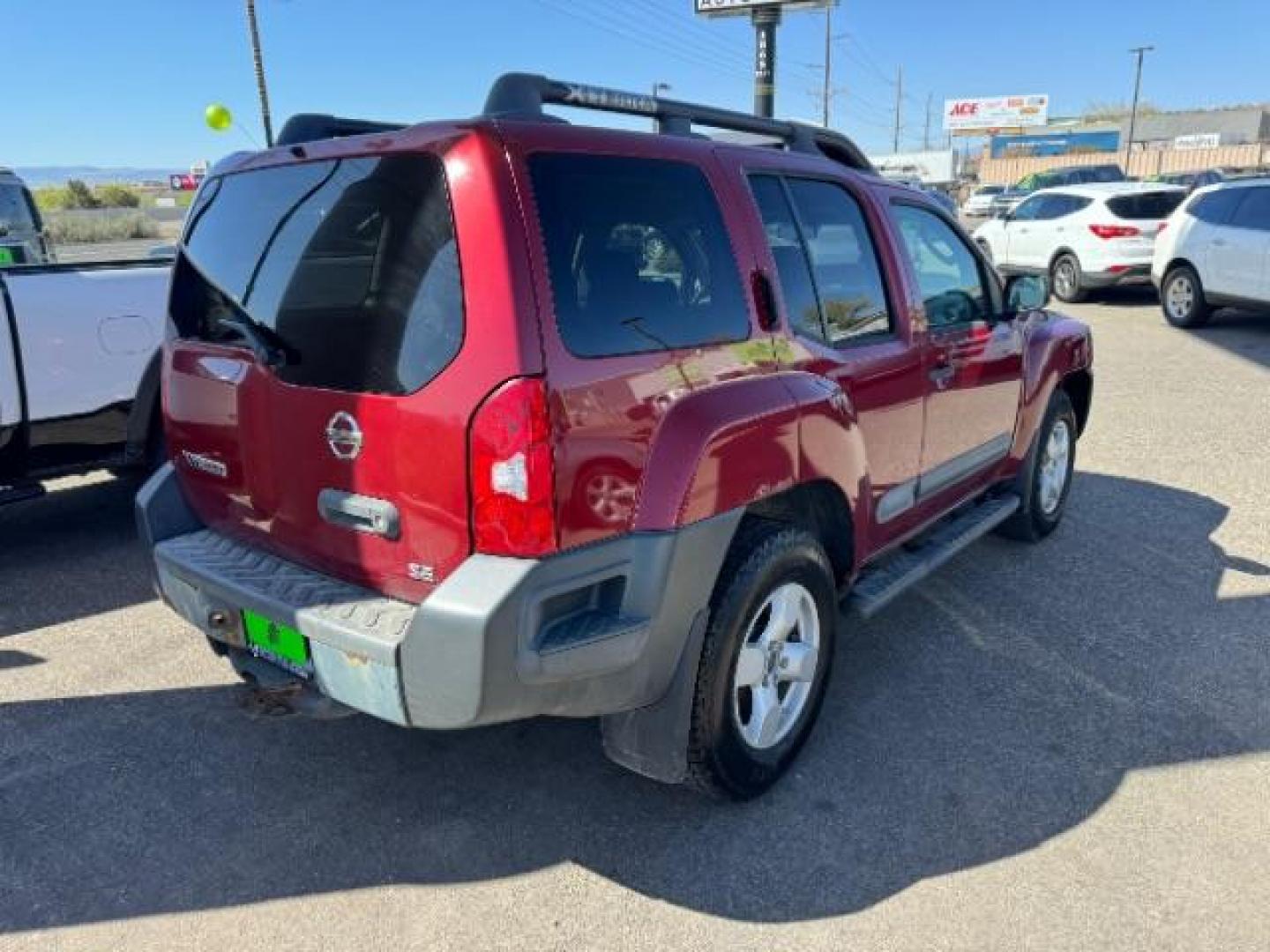 2005 Red Brawn /Desert Cloth Interior Nissan Xterra S 4WD (5N1AN08W55C) with an 4.0L V6 DOHC 24V engine, 5-Speed Automatic transmission, located at 1865 East Red Hills Pkwy, St. George, 84770, (435) 628-0023, 37.120850, -113.543640 - Photo#6