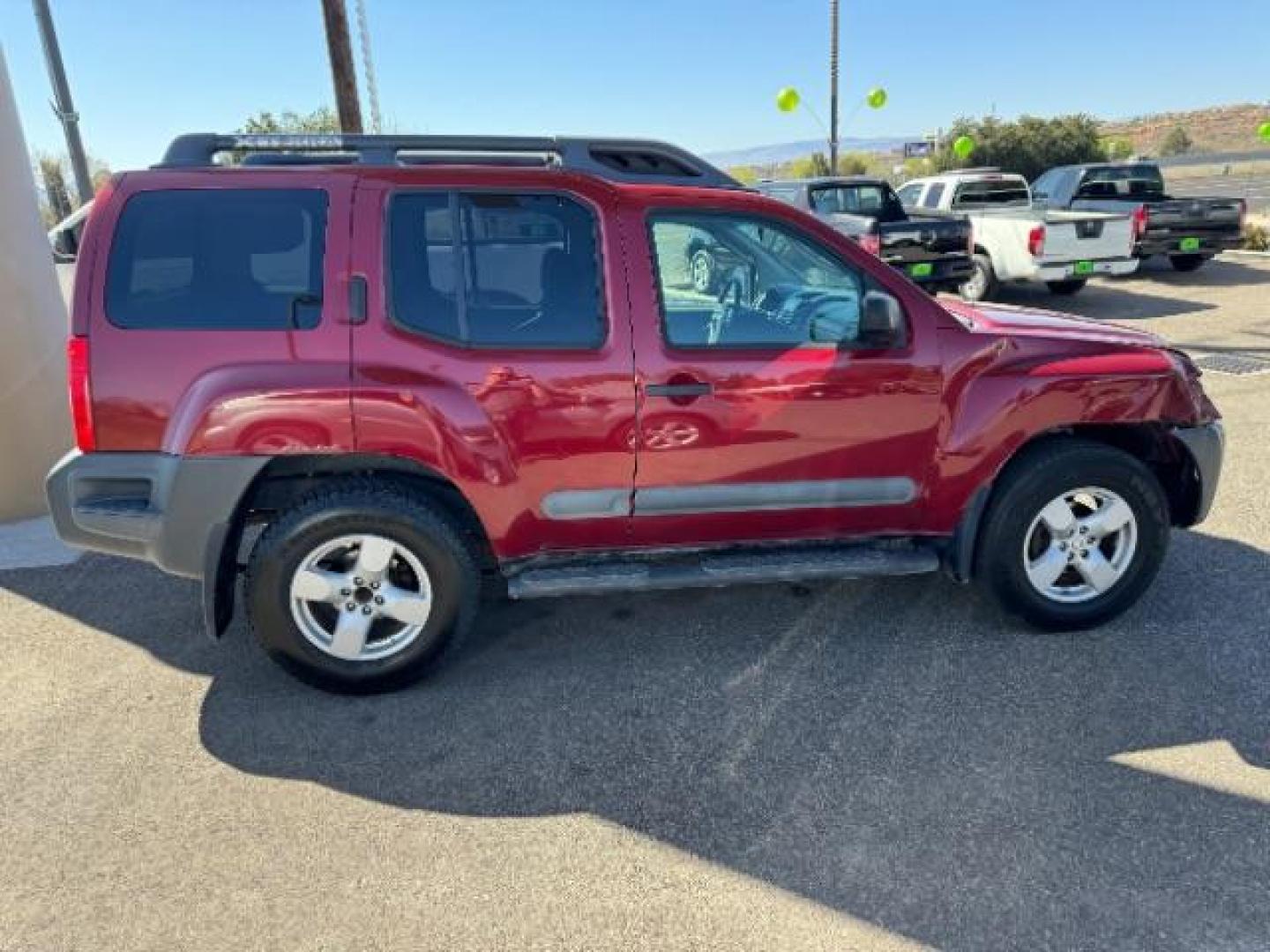 2005 Red Brawn /Desert Cloth Interior Nissan Xterra S 4WD (5N1AN08W55C) with an 4.0L V6 DOHC 24V engine, 5-Speed Automatic transmission, located at 1865 East Red Hills Pkwy, St. George, 84770, (435) 628-0023, 37.120850, -113.543640 - Photo#7