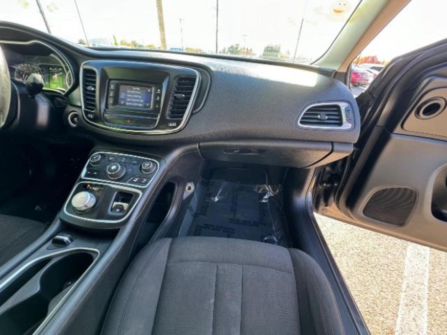 2015 Granite Crystal Met CC /Black Chrysler 200 Limited (1C3CCCAB5FN) with an 2.4L L4 DOHC 16V engine, 9-Speed Automatic transmission, located at 940 North Main Street, Cedar City, UT, 84720, (435) 628-0023, 37.692936, -113.061897 - We specialize in helping ALL people get the best financing available. No matter your credit score, good, bad or none we can get you an amazing rate. Had a bankruptcy, divorce, or repossessions? We give you the green light to get your credit back on the road. Low down and affordable payments that fit - Photo#34