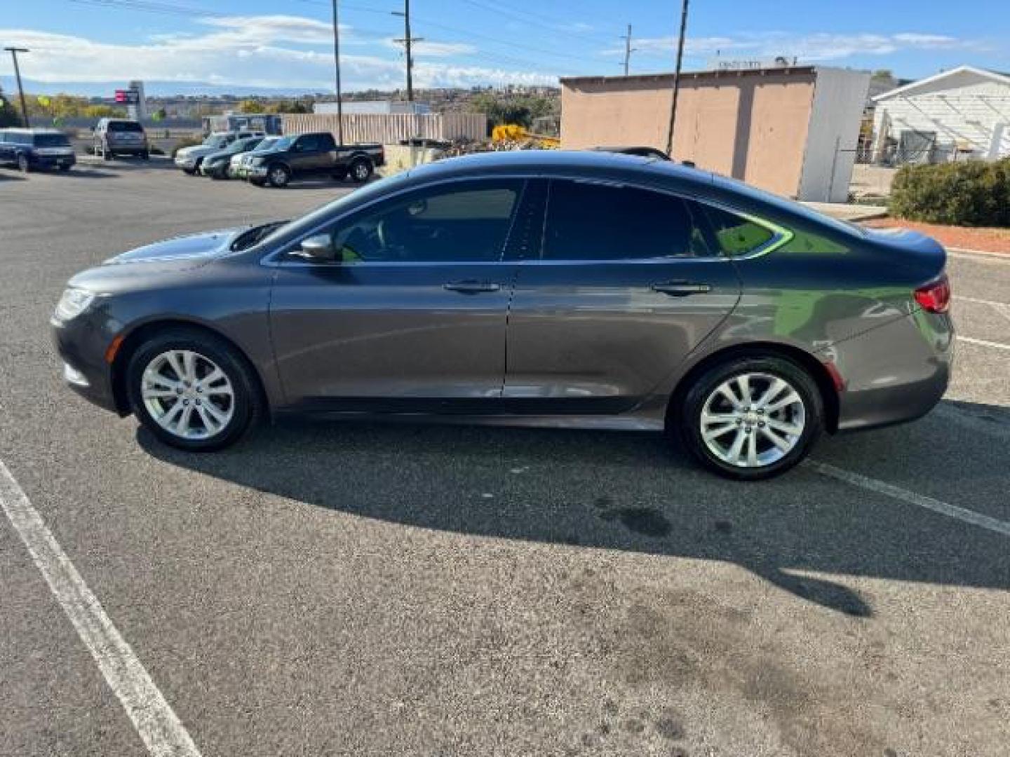 2015 Granite Crystal Met CC /Black Chrysler 200 Limited (1C3CCCAB5FN) with an 2.4L L4 DOHC 16V engine, 9-Speed Automatic transmission, located at 940 North Main Street, Cedar City, UT, 84720, (435) 628-0023, 37.692936, -113.061897 - We specialize in helping ALL people get the best financing available. No matter your credit score, good, bad or none we can get you an amazing rate. Had a bankruptcy, divorce, or repossessions? We give you the green light to get your credit back on the road. Low down and affordable payments that fit - Photo#5