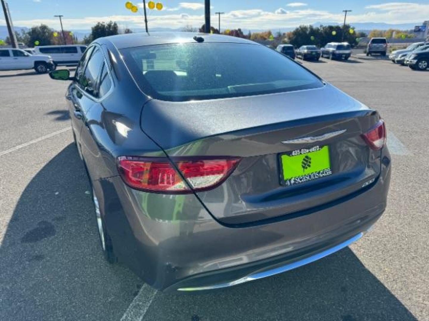 2015 Granite Crystal Met CC /Black Chrysler 200 Limited (1C3CCCAB5FN) with an 2.4L L4 DOHC 16V engine, 9-Speed Automatic transmission, located at 940 North Main Street, Cedar City, UT, 84720, (435) 628-0023, 37.692936, -113.061897 - We specialize in helping ALL people get the best financing available. No matter your credit score, good, bad or none we can get you an amazing rate. Had a bankruptcy, divorce, or repossessions? We give you the green light to get your credit back on the road. Low down and affordable payments that fit - Photo#7