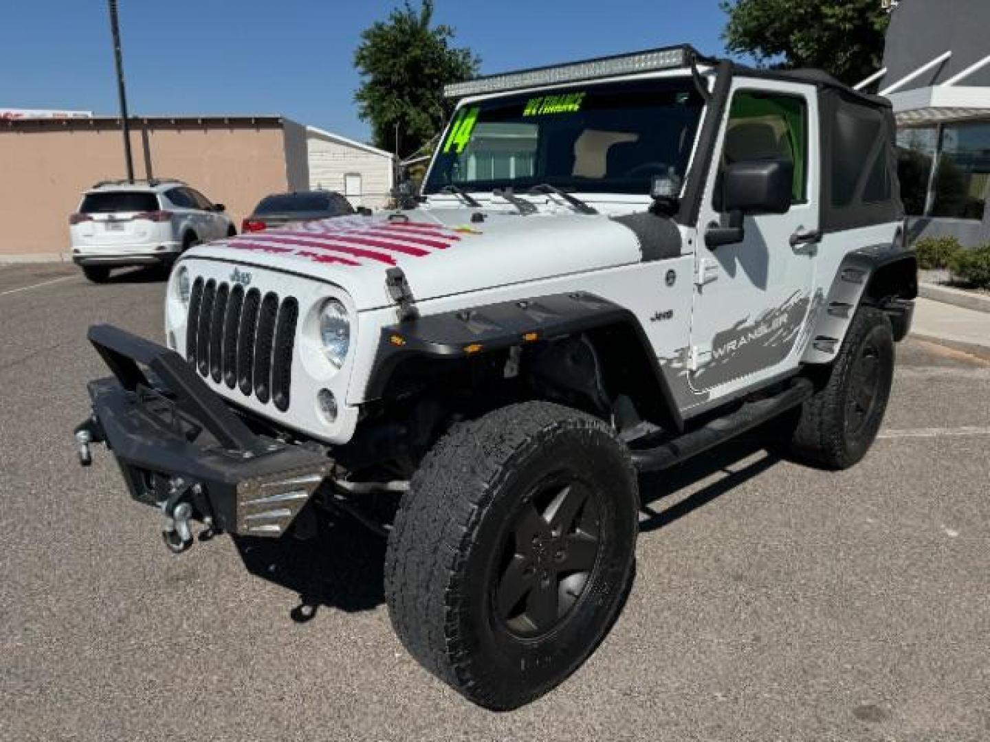 2014 Bright White Clearcoat /Black Jeep Wrangler Sport 4WD (1C4AJWAG6EL) with an 3.6L V6 DOHC 24V FFV engine, 5-Speed Automatic transmission, located at 1865 East Red Hills Pkwy, St. George, 84770, (435) 628-0023, 37.120850, -113.543640 - Photo#2