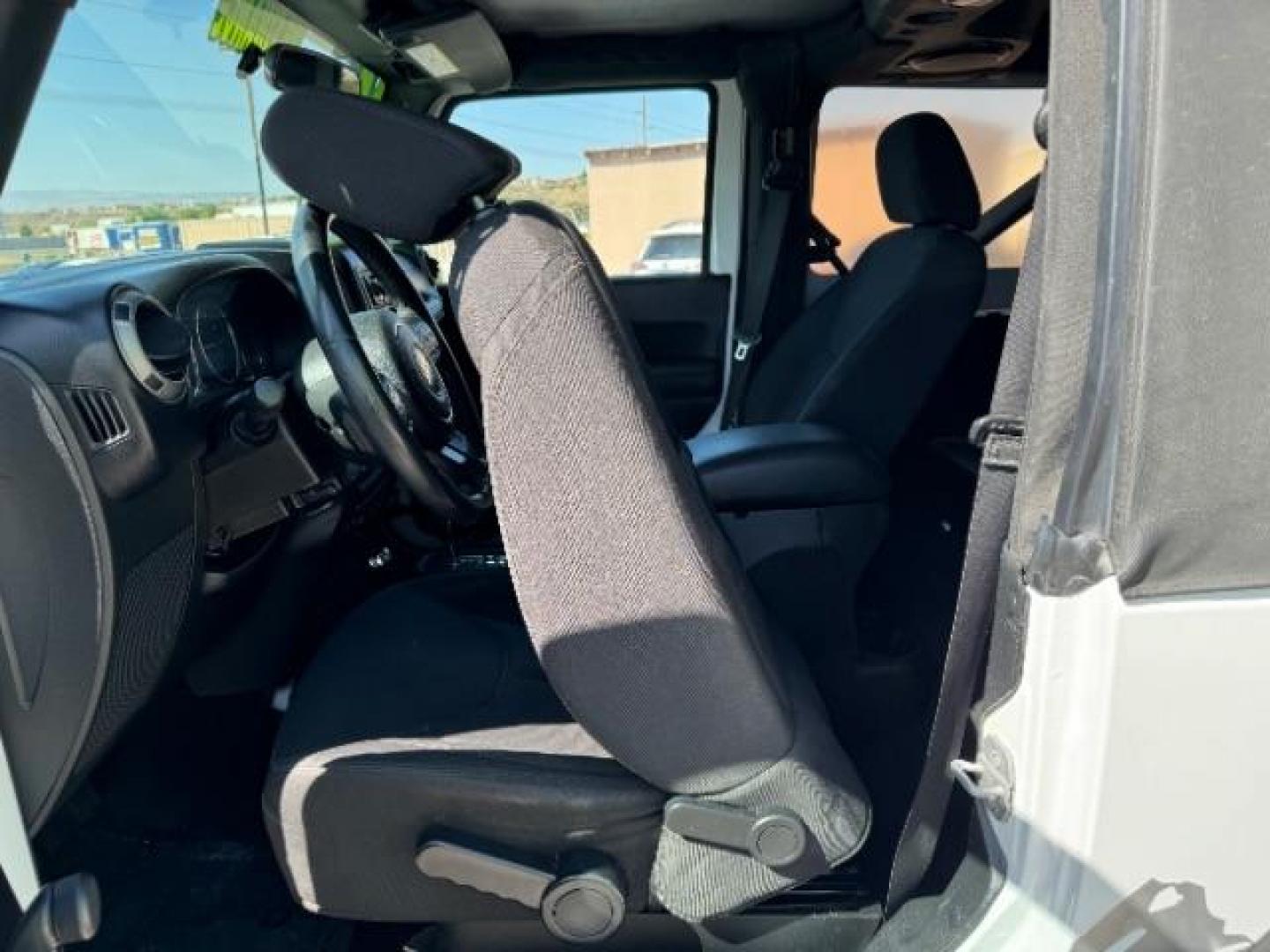 2014 Bright White Clearcoat /Black Jeep Wrangler Sport 4WD (1C4AJWAG6EL) with an 3.6L V6 DOHC 24V FFV engine, 5-Speed Automatic transmission, located at 1865 East Red Hills Pkwy, St. George, 84770, (435) 628-0023, 37.120850, -113.543640 - We specialize in helping ALL people get the best financing available. No matter your credit score, good, bad or none we can get you an amazing rate. Had a bankruptcy, divorce, or repossessions? We give you the green light to get your credit back on the road. Low down and affordable payments that fit - Photo#21