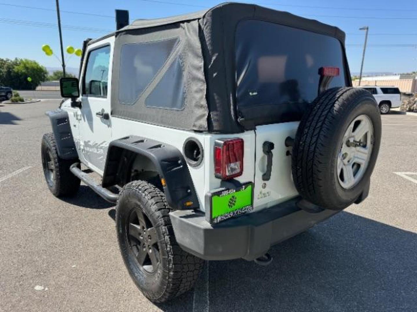 2014 Bright White Clearcoat /Black Jeep Wrangler Sport 4WD (1C4AJWAG6EL) with an 3.6L V6 DOHC 24V FFV engine, 5-Speed Automatic transmission, located at 1865 East Red Hills Pkwy, St. George, 84770, (435) 628-0023, 37.120850, -113.543640 - We specialize in helping ALL people get the best financing available. No matter your credit score, good, bad or none we can get you an amazing rate. Had a bankruptcy, divorce, or repossessions? We give you the green light to get your credit back on the road. Low down and affordable payments that fit - Photo#4