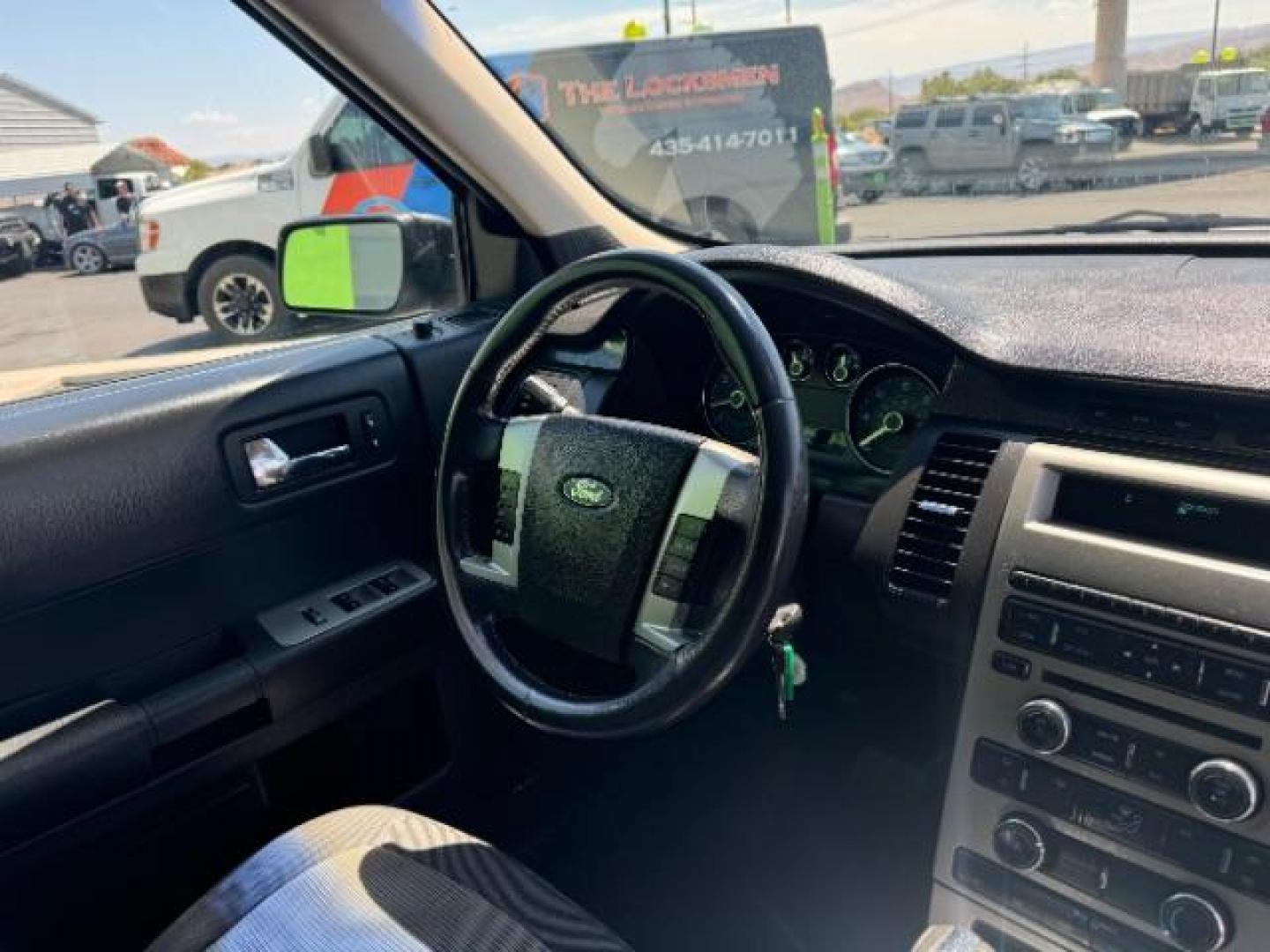 2011 Ingot Silver Metalli /Charcoal Black Cloth Ford Flex SE FWD (2FMGK5BC4BB) with an 3.5L V6 DOHC 24V engine, 6-Speed Automatic Ov transmission, located at 1865 East Red Hills Pkwy, St. George, 84770, (435) 628-0023, 37.120850, -113.543640 - Photo#35