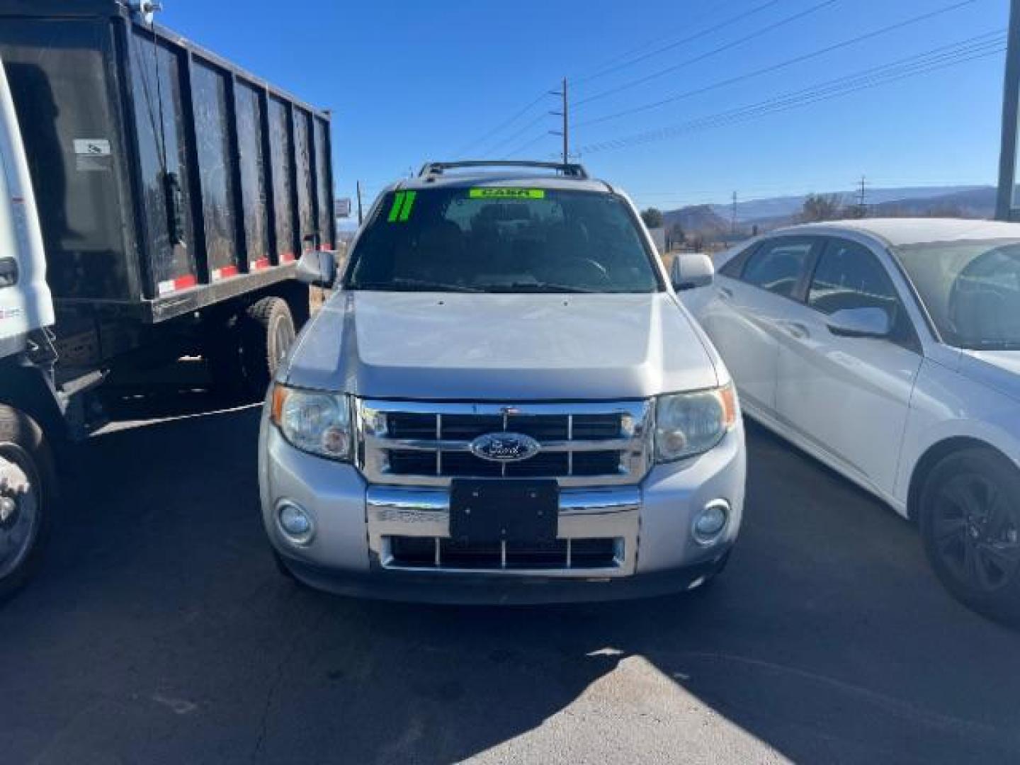 2011 Ingot Silver Metalli /Charcoal Black Leath Ford Escape Limited FWD (1FMCU0EG7BK) with an 3.0L V6 DOHC 24V engine, 6-Speed Automatic transmission, located at 1865 East Red Hills Pkwy, St. George, 84770, (435) 628-0023, 37.120850, -113.543640 - This vehicle is a Mechanic Special. This means it will need some love. Runs a drives fine but has body damage, leaks or other mechanical issues. It did NOT pass our 50 point inspection. Get a great deal on a less than perfect car. These cars do NOT qualify for our in house financing. Cash and carry, - Photo#1