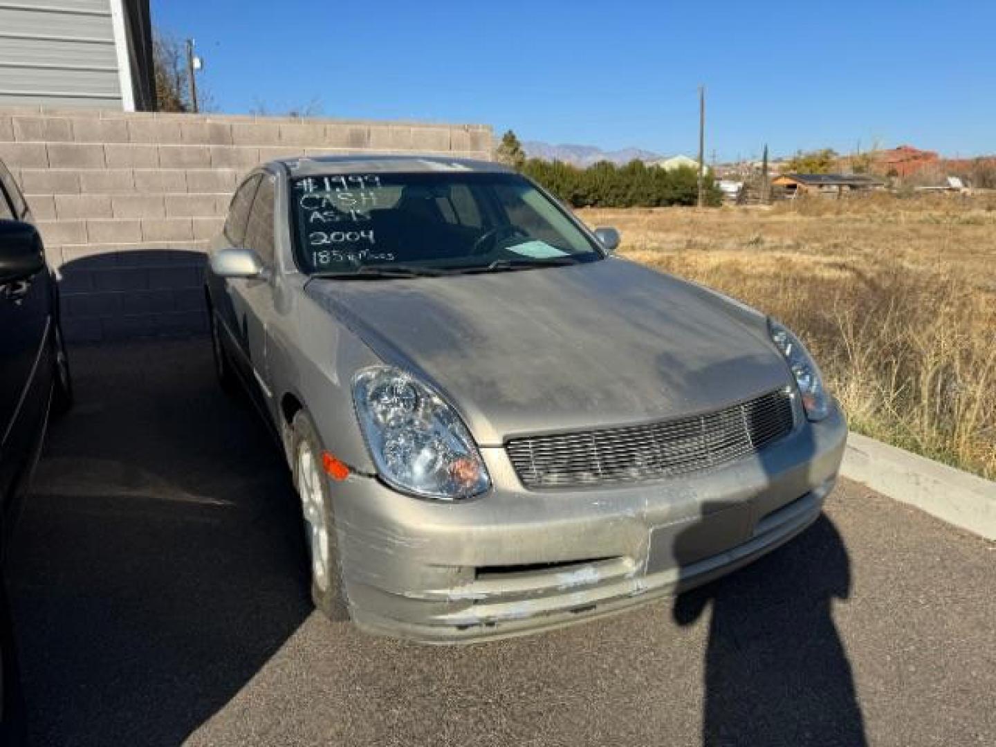 2004 Desert Platinum /Black Leather interi Infiniti G35 Sedan AWD with Leath (JNKCV51F74M) with an 3.5L V6 DOHC 24V engine, 5-Speed Automatic transmission, located at 1865 East Red Hills Pkwy, St. George, 84770, (435) 628-0023, 37.120850, -113.543640 - This vehicle is a Mechanic Special. This means it will need some love. Runs a drives fine but has body damage, leaks or other mechanical issues. It did NOT pass our 50 point inspection. Get a great deal on a less than perfect car. These cars do NOT qualify for our in house financing. Cash and carry, - Photo#0