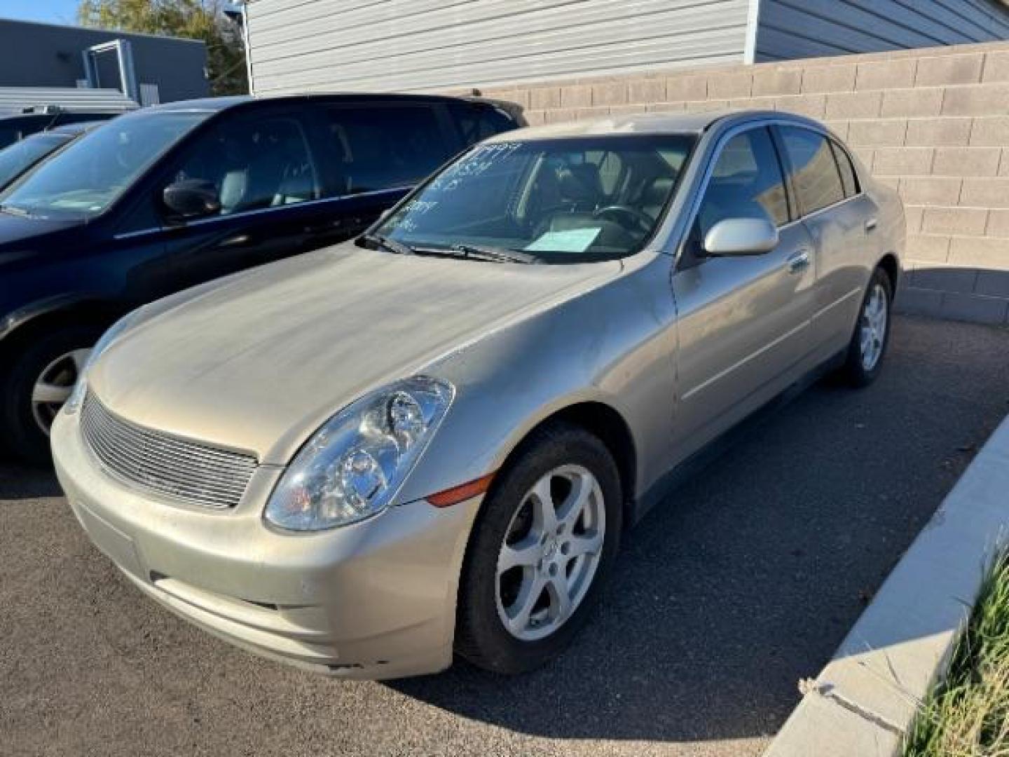 2004 Desert Platinum /Black Leather interi Infiniti G35 Sedan AWD with Leath (JNKCV51F74M) with an 3.5L V6 DOHC 24V engine, 5-Speed Automatic transmission, located at 1865 East Red Hills Pkwy, St. George, 84770, (435) 628-0023, 37.120850, -113.543640 - This vehicle is a Mechanic Special. This means it will need some love. Runs a drives fine but has body damage, leaks or other mechanical issues. It did NOT pass our 50 point inspection. Get a great deal on a less than perfect car. These cars do NOT qualify for our in house financing. Cash and carry, - Photo#2