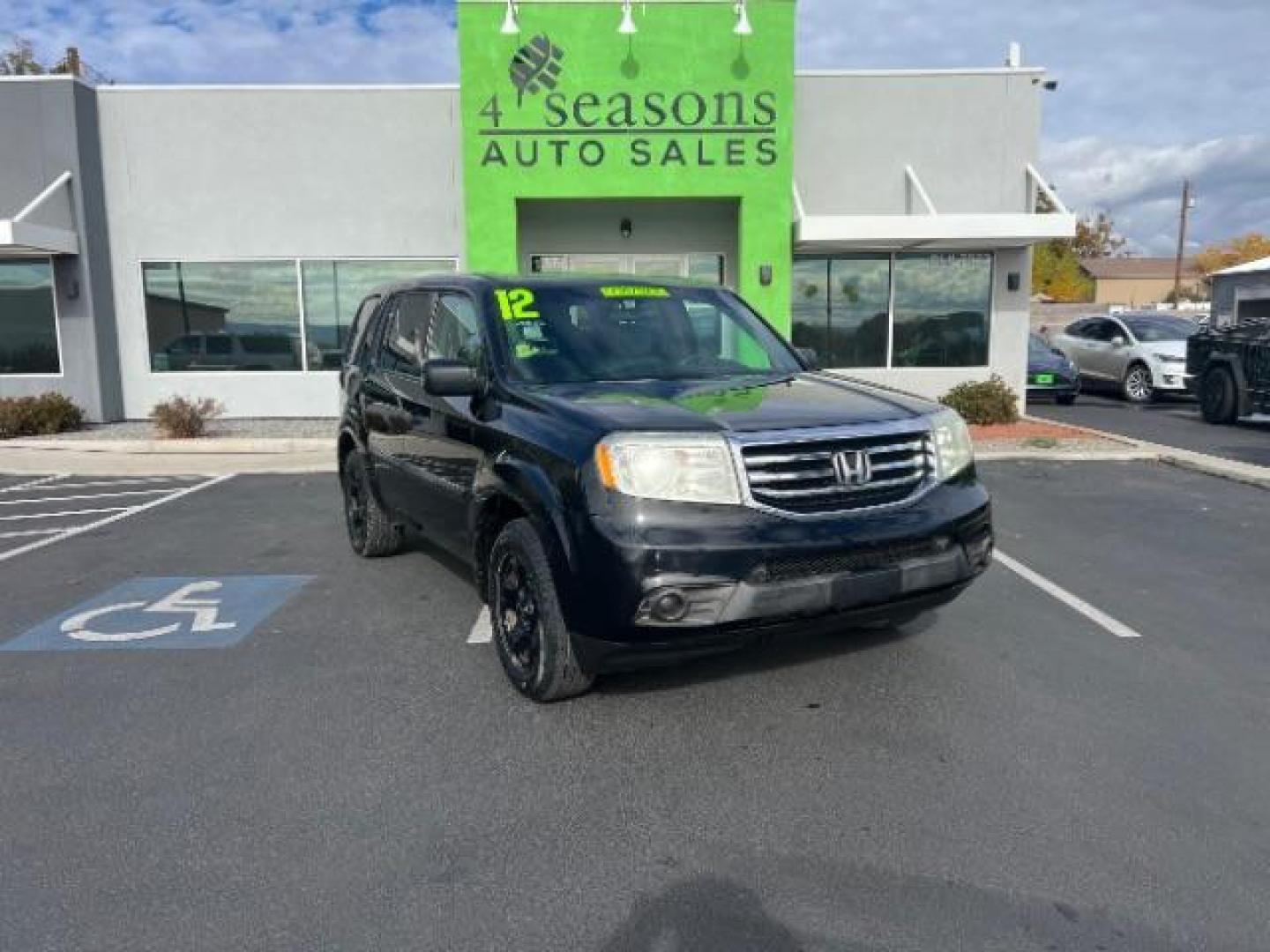 2012 Crystal Black Pearl /Gray Cloth Interior Honda Pilot LX 2WD 5-Spd AT (5FNYF3H27CB) with an 3.5L V6 SOHC 24V engine, 5-Speed Automatic transmission, located at 1865 East Red Hills Pkwy, St. George, 84770, (435) 628-0023, 37.120850, -113.543640 - Photo#0