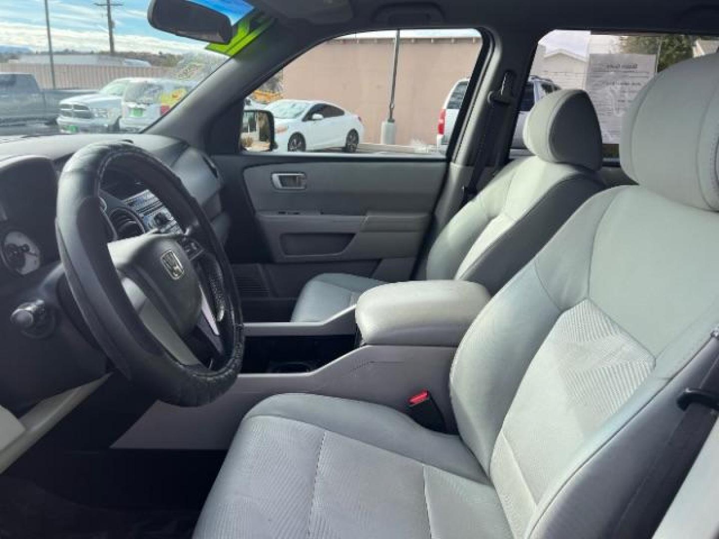 2012 Crystal Black Pearl /Gray Cloth Interior Honda Pilot LX 2WD 5-Spd AT (5FNYF3H27CB) with an 3.5L V6 SOHC 24V engine, 5-Speed Automatic transmission, located at 1865 East Red Hills Pkwy, St. George, 84770, (435) 628-0023, 37.120850, -113.543640 - Photo#12