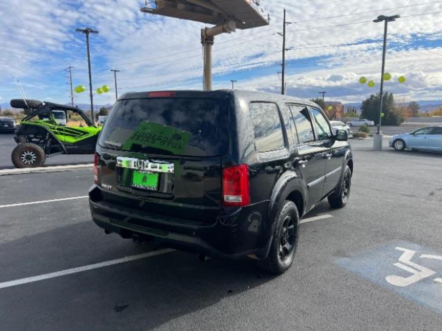 2012 Crystal Black Pearl /Gray Cloth Interior Honda Pilot LX 2WD 5-Spd AT (5FNYF3H27CB) with an 3.5L V6 SOHC 24V engine, 5-Speed Automatic transmission, located at 1865 East Red Hills Pkwy, St. George, 84770, (435) 628-0023, 37.120850, -113.543640 - Photo#4