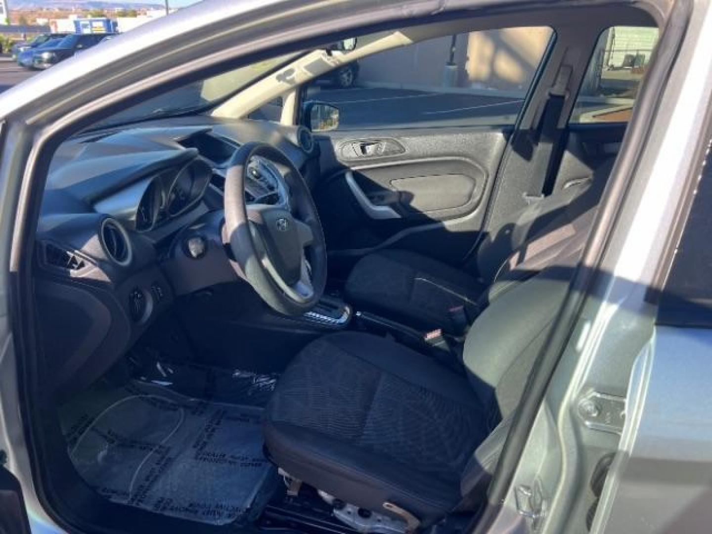 2012 Ingot Silver Metalli /Charcoal Black Cloth Ford Fiesta SE Sedan (3FADP4BJ2CM) with an 1.6L L4 DOHC 16V engine, 6-Speed Automatic transmission, located at 940 North Main Street, Cedar City, UT, 84720, (435) 628-0023, 37.692936, -113.061897 - We specialize in helping ALL people get the best financing available. No matter your credit score, good, bad or none we can get you an amazing rate. Had a bankruptcy, divorce, or repossessions? We give you the green light to get your credit back on the road. Low down and affordable payments that fit - Photo#12