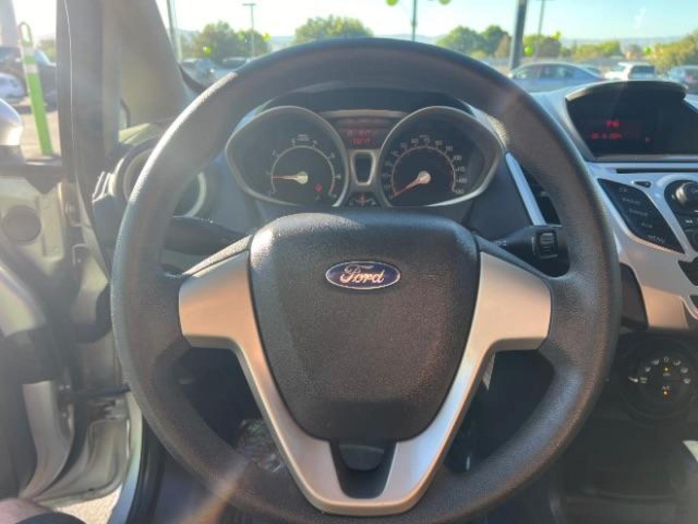 2012 Ingot Silver Metalli /Charcoal Black Cloth Ford Fiesta SE Sedan (3FADP4BJ2CM) with an 1.6L L4 DOHC 16V engine, 6-Speed Automatic transmission, located at 940 North Main Street, Cedar City, UT, 84720, (435) 628-0023, 37.692936, -113.061897 - We specialize in helping ALL people get the best financing available. No matter your credit score, good, bad or none we can get you an amazing rate. Had a bankruptcy, divorce, or repossessions? We give you the green light to get your credit back on the road. Low down and affordable payments that fit - Photo#16