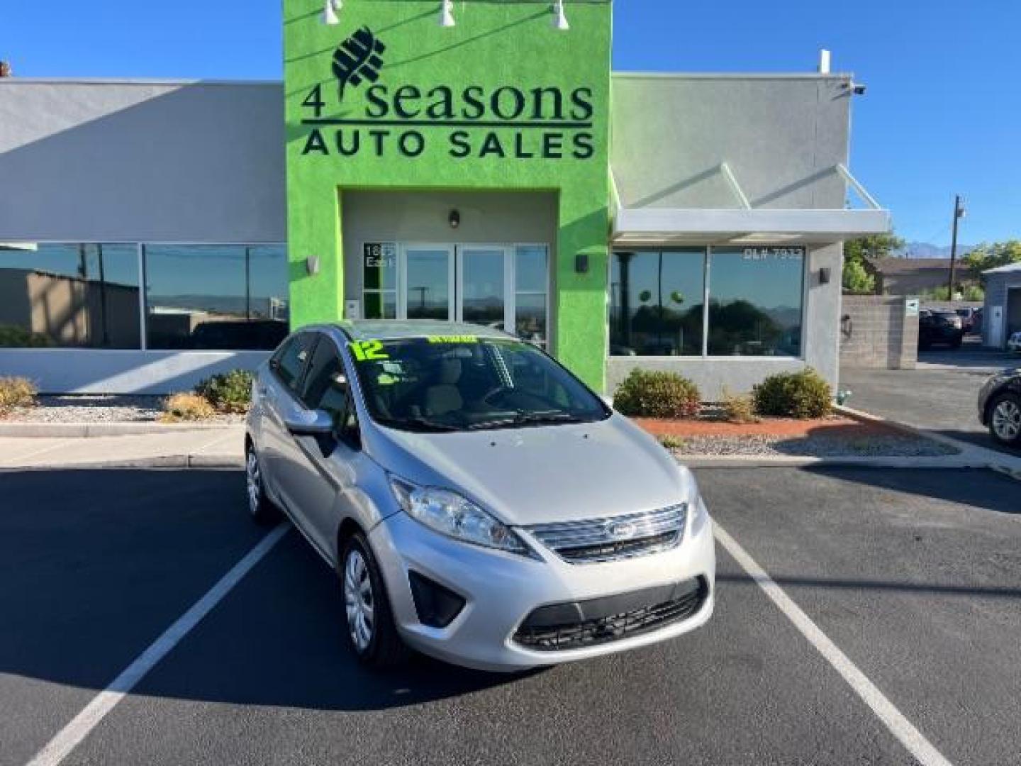 2012 Ingot Silver Metalli /Charcoal Black Cloth Ford Fiesta SE Sedan (3FADP4BJ2CM) with an 1.6L L4 DOHC 16V engine, 6-Speed Automatic transmission, located at 940 North Main Street, Cedar City, UT, 84720, (435) 628-0023, 37.692936, -113.061897 - We specialize in helping ALL people get the best financing available. No matter your credit score, good, bad or none we can get you an amazing rate. Had a bankruptcy, divorce, or repossessions? We give you the green light to get your credit back on the road. Low down and affordable payments that fit - Photo#0