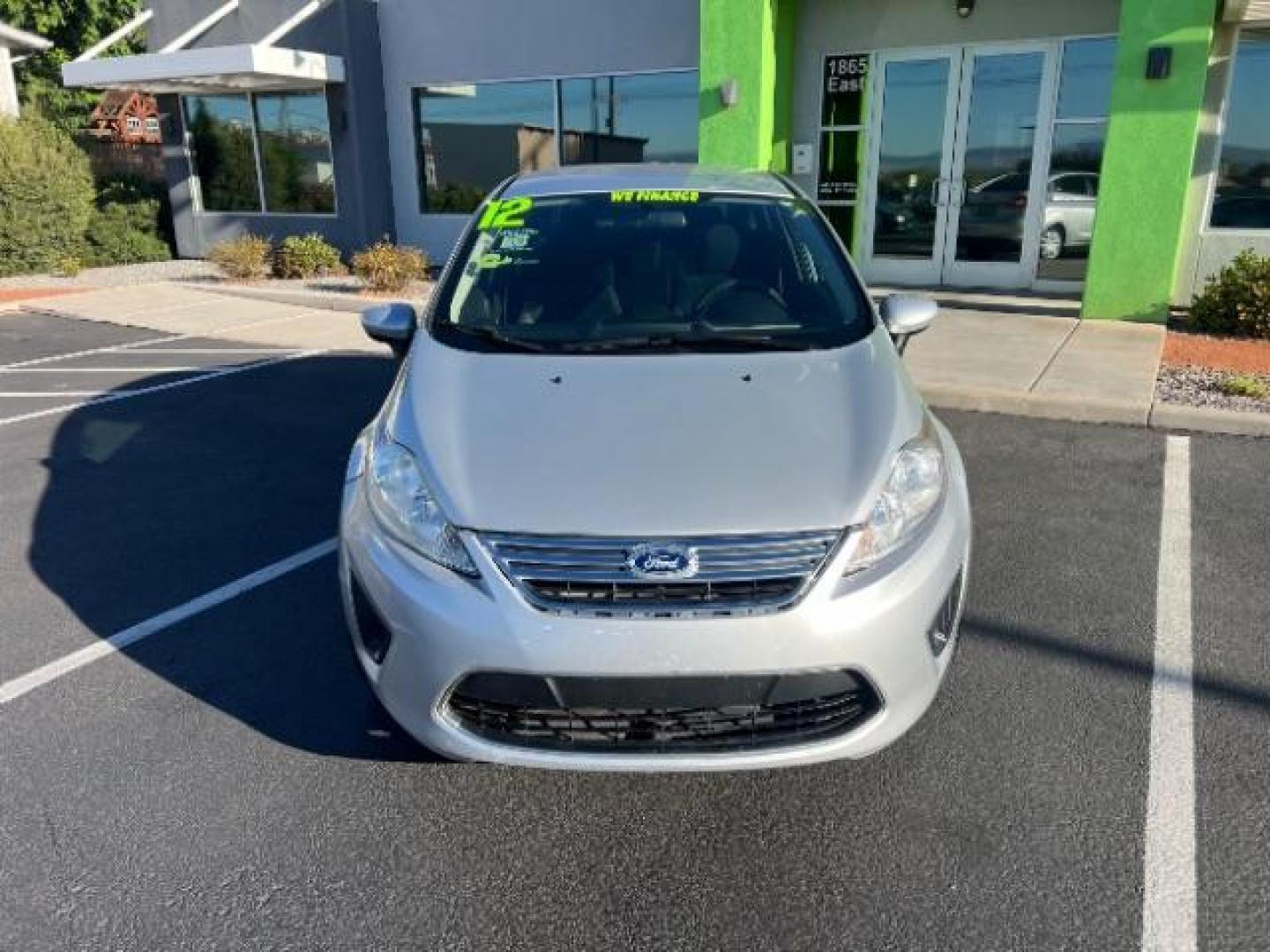 2012 Ingot Silver Metalli /Charcoal Black Cloth Ford Fiesta SE Sedan (3FADP4BJ2CM) with an 1.6L L4 DOHC 16V engine, 6-Speed Automatic transmission, located at 940 North Main Street, Cedar City, UT, 84720, (435) 628-0023, 37.692936, -113.061897 - We specialize in helping ALL people get the best financing available. No matter your credit score, good, bad or none we can get you an amazing rate. Had a bankruptcy, divorce, or repossessions? We give you the green light to get your credit back on the road. Low down and affordable payments that fit - Photo#1