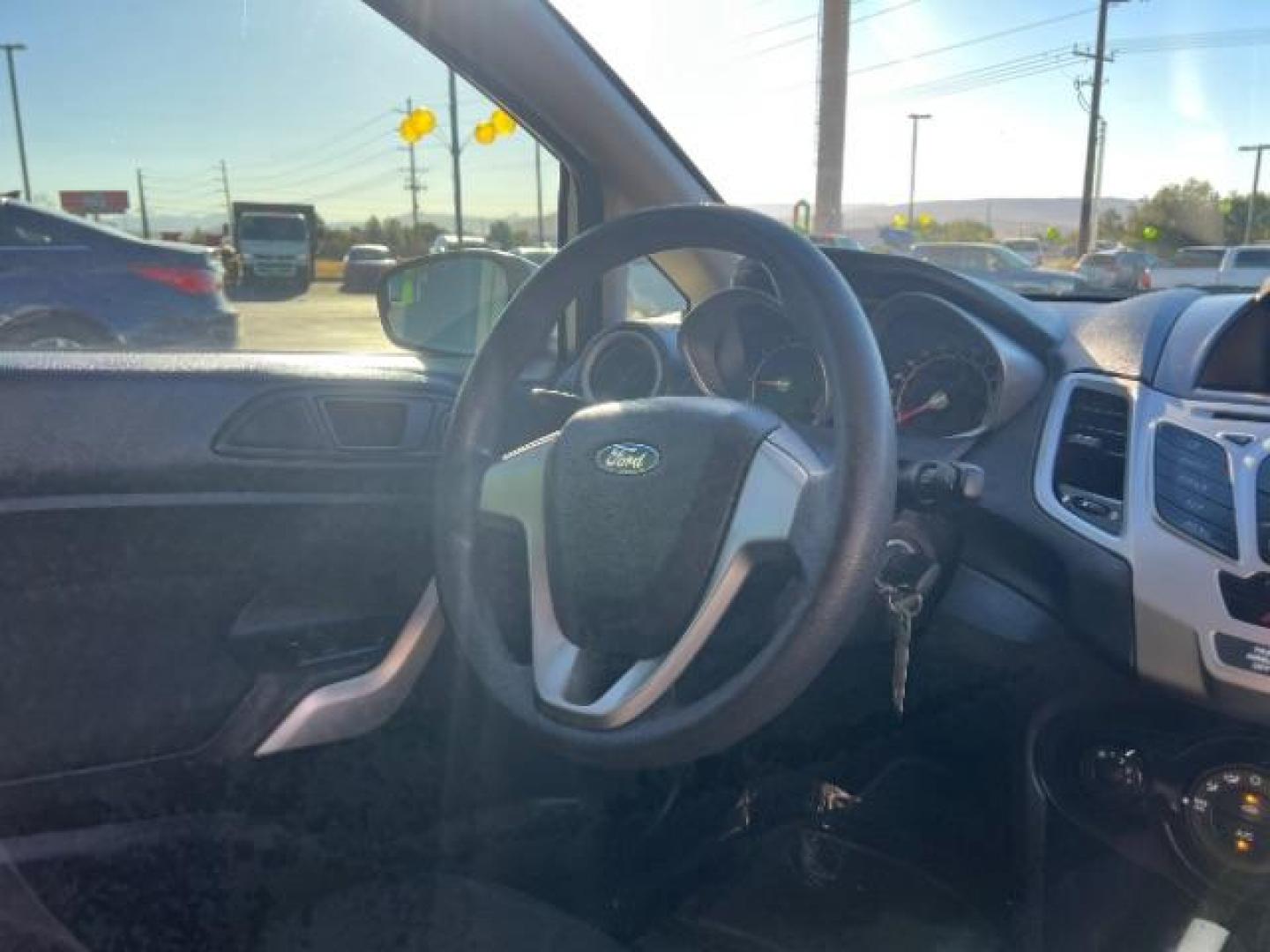 2012 Ingot Silver Metalli /Charcoal Black Cloth Ford Fiesta SE Sedan (3FADP4BJ2CM) with an 1.6L L4 DOHC 16V engine, 6-Speed Automatic transmission, located at 940 North Main Street, Cedar City, UT, 84720, (435) 628-0023, 37.692936, -113.061897 - We specialize in helping ALL people get the best financing available. No matter your credit score, good, bad or none we can get you an amazing rate. Had a bankruptcy, divorce, or repossessions? We give you the green light to get your credit back on the road. Low down and affordable payments that fit - Photo#31