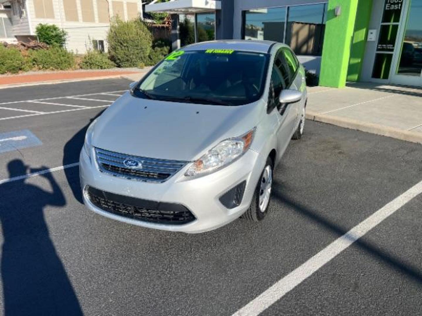 2012 Ingot Silver Metalli /Charcoal Black Cloth Ford Fiesta SE Sedan (3FADP4BJ2CM) with an 1.6L L4 DOHC 16V engine, 6-Speed Automatic transmission, located at 940 North Main Street, Cedar City, UT, 84720, (435) 628-0023, 37.692936, -113.061897 - We specialize in helping ALL people get the best financing available. No matter your credit score, good, bad or none we can get you an amazing rate. Had a bankruptcy, divorce, or repossessions? We give you the green light to get your credit back on the road. Low down and affordable payments that fit - Photo#2